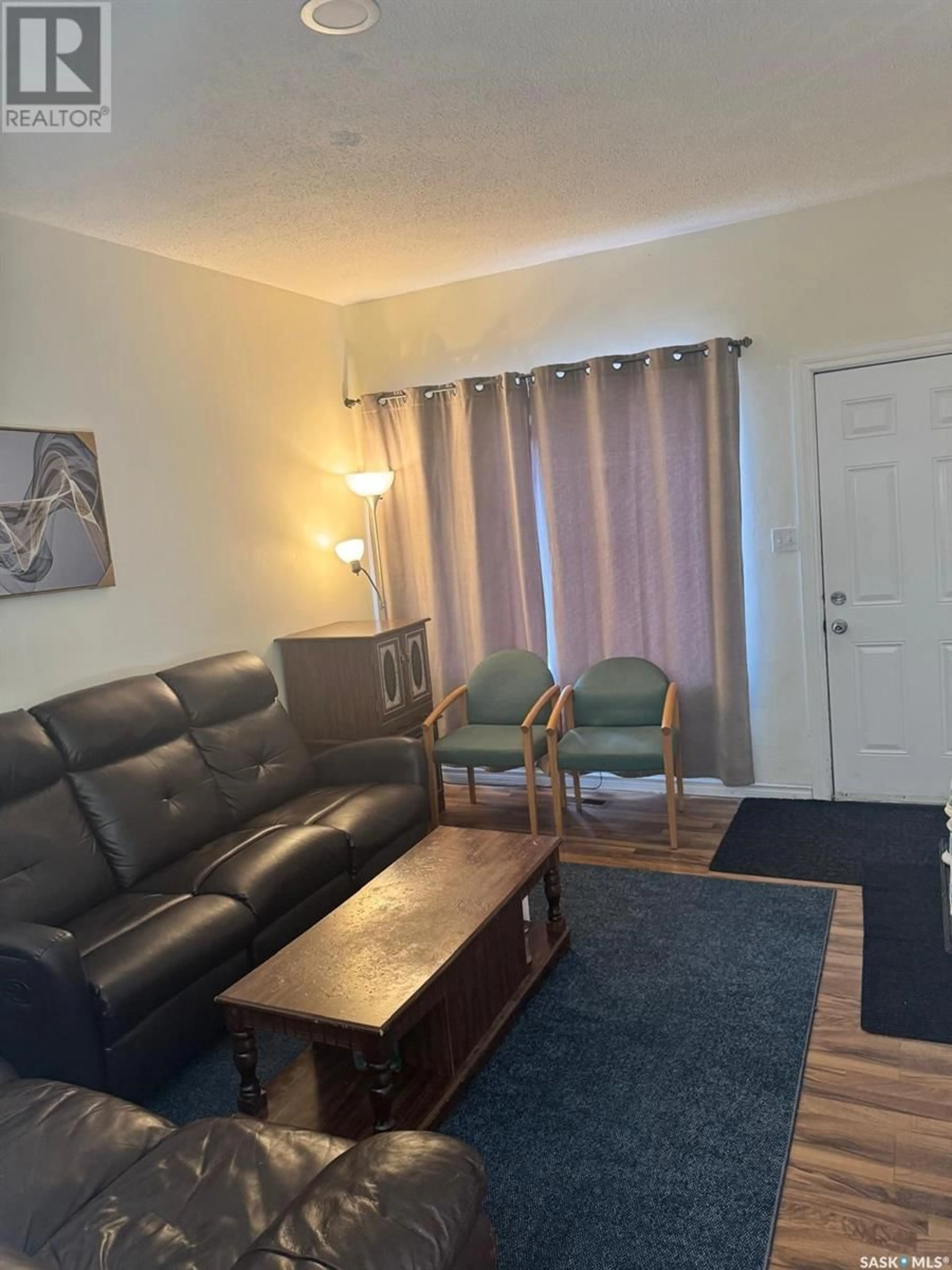 Living room with furniture, unknown for 1447 Rae STREET, Regina Saskatchewan S4T2C5