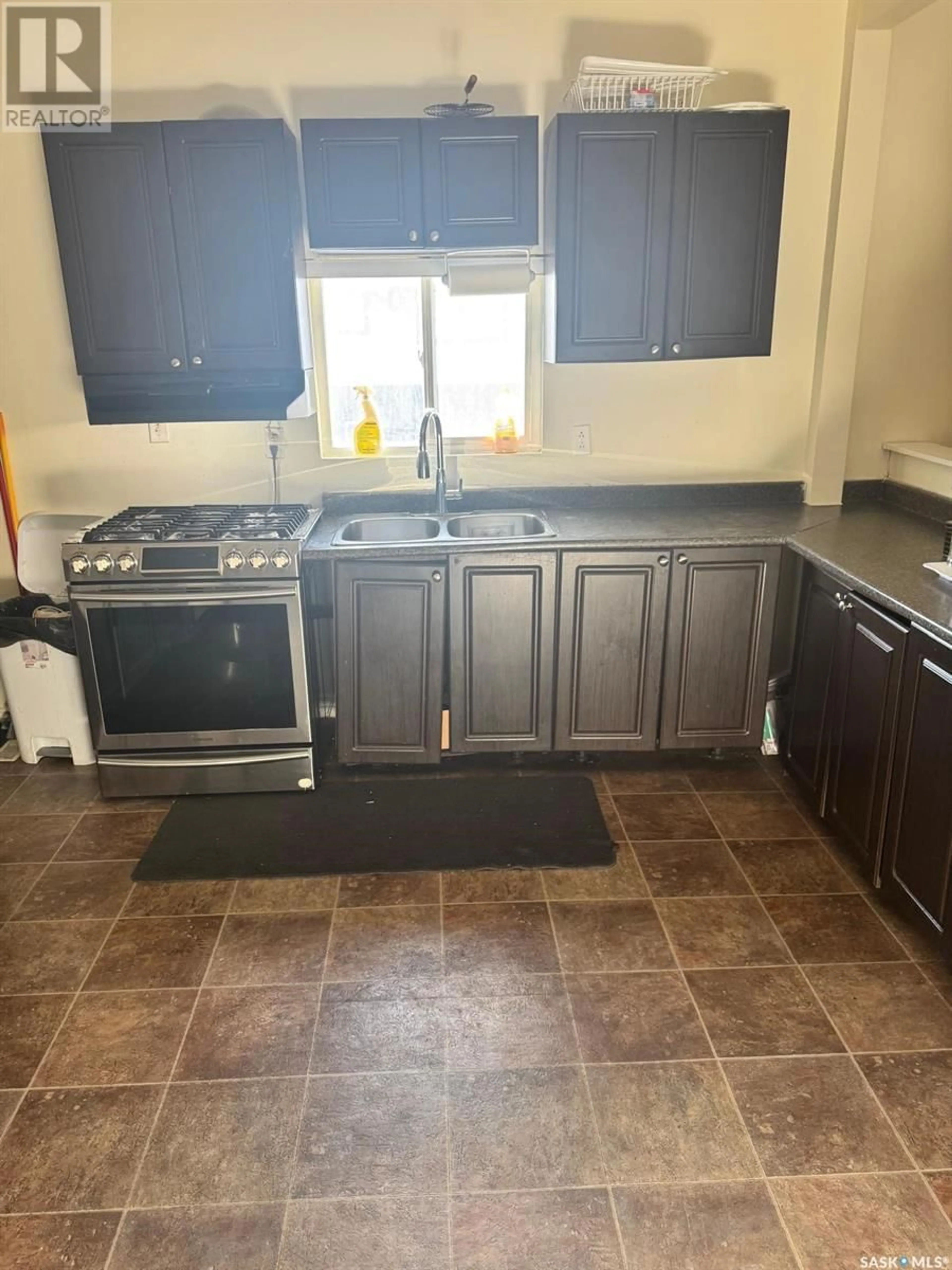 Standard kitchen, ceramic/tile floor for 1447 Rae STREET, Regina Saskatchewan S4T2C5