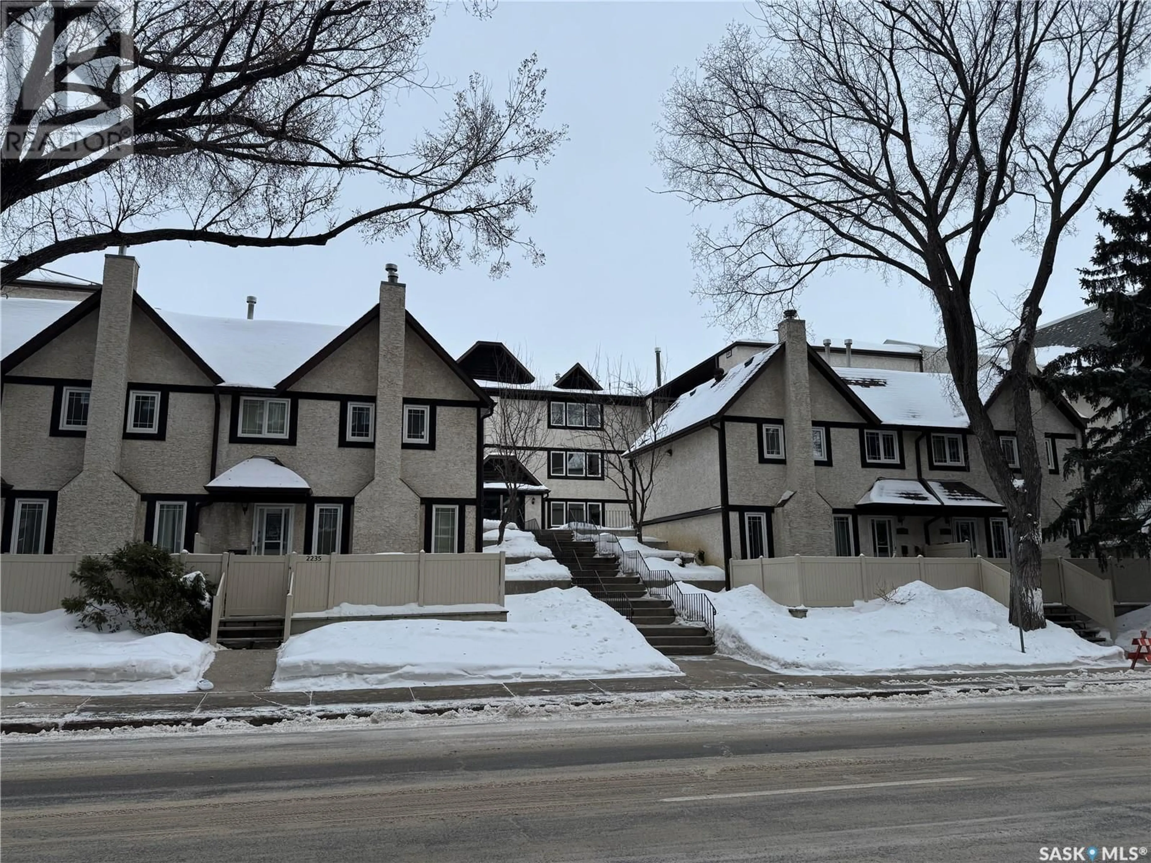 A pic from outside/outdoor area/front of a property/back of a property/a pic from drone, street for 202 2237 McIntyre STREET, Regina Saskatchewan S4P2S1