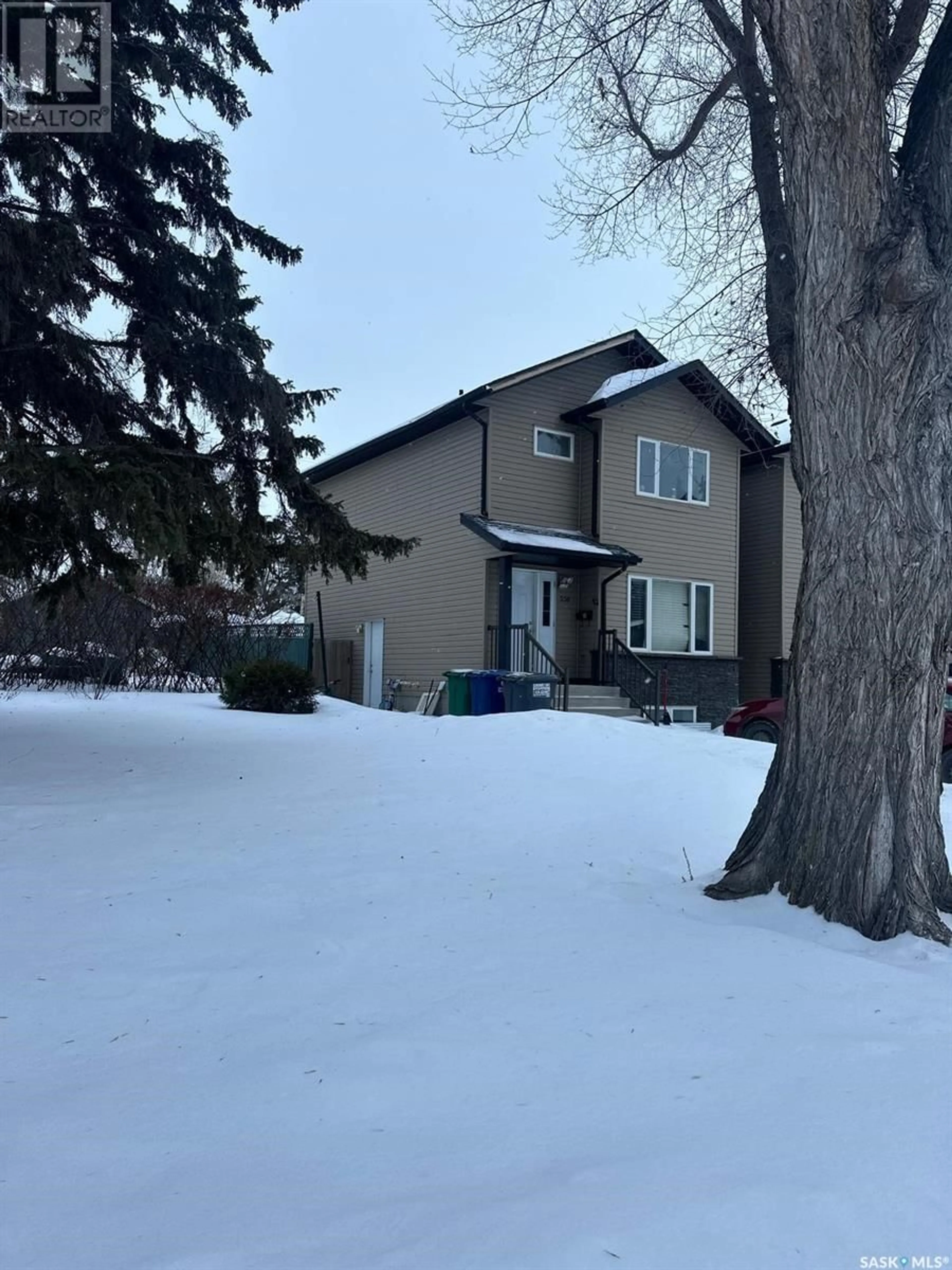 A pic from outside/outdoor area/front of a property/back of a property/a pic from drone, street for 230 K AVENUE N, Saskatoon Saskatchewan S7L2M3