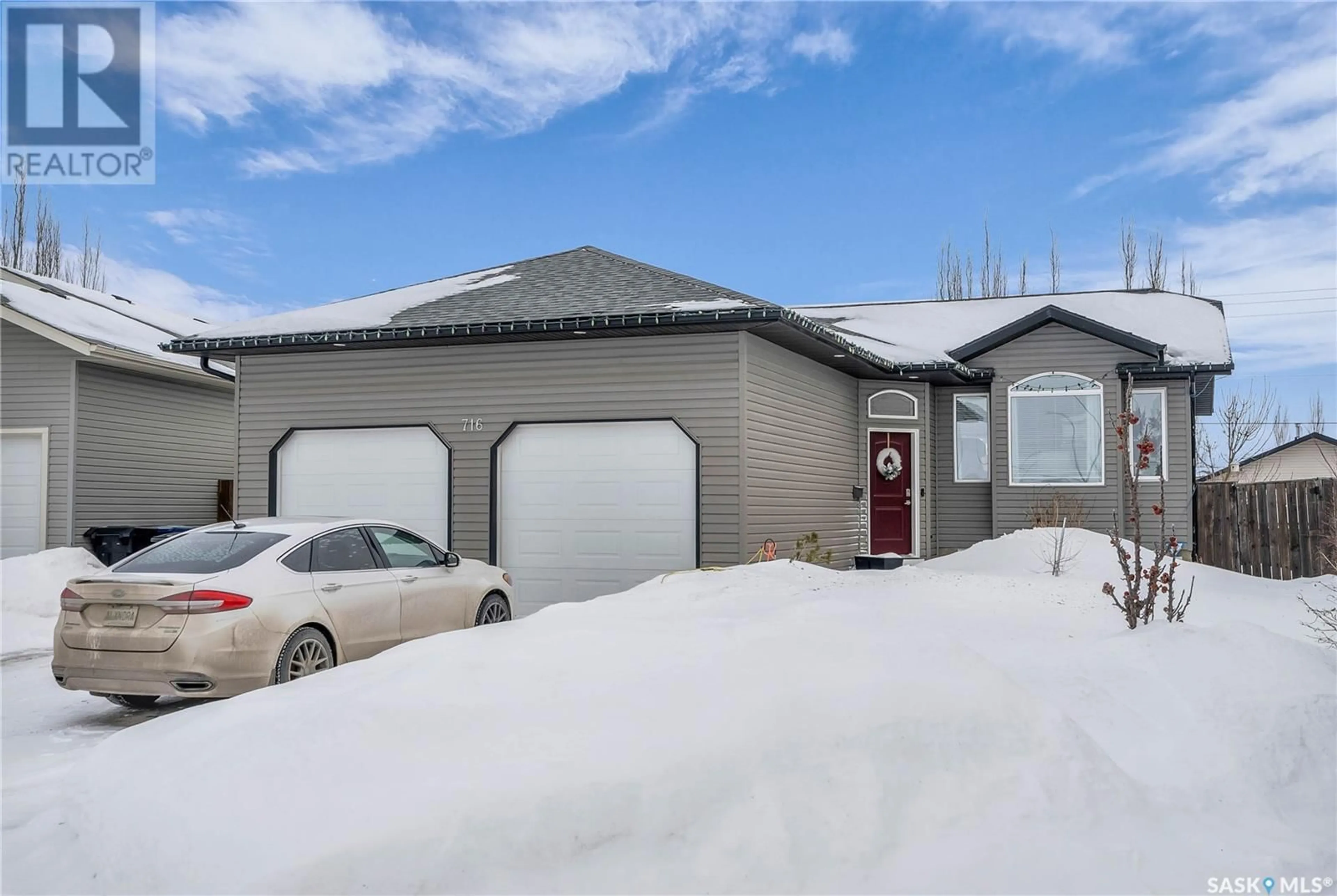 Home with vinyl exterior material, street for 716 Harder COURT, Martensville Saskatchewan S0K0A2