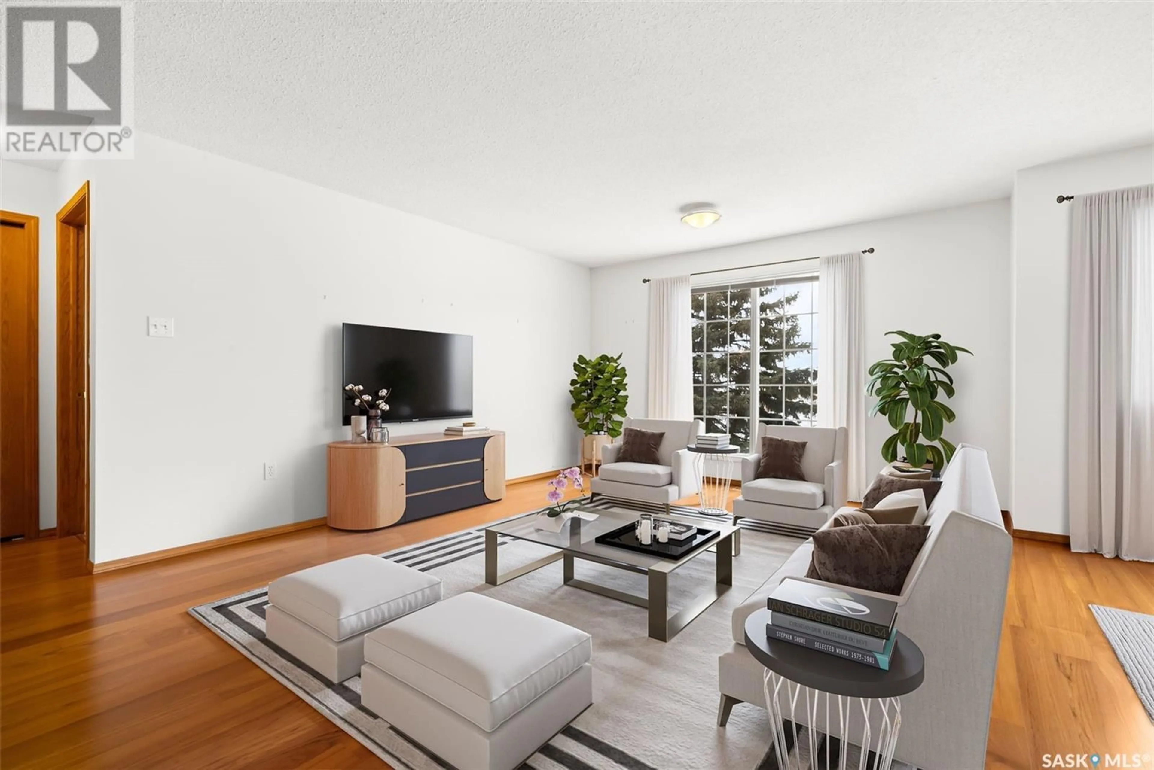 Living room with furniture, unknown for 201 4025 Hill AVENUE, Regina Saskatchewan S4S0X7