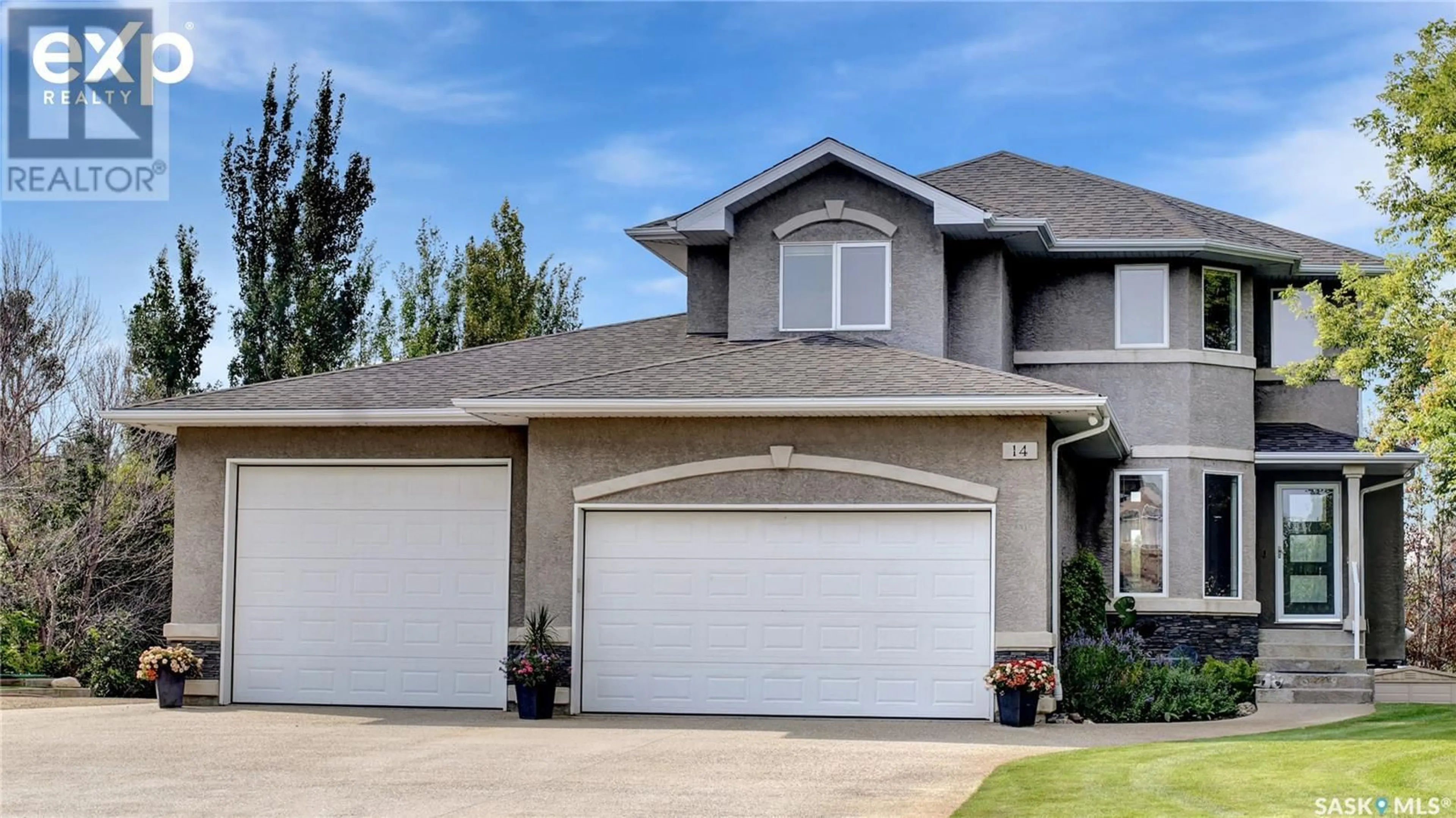 Home with vinyl exterior material, street for 14 Emerald RIDGE, White City Saskatchewan S4L5B1