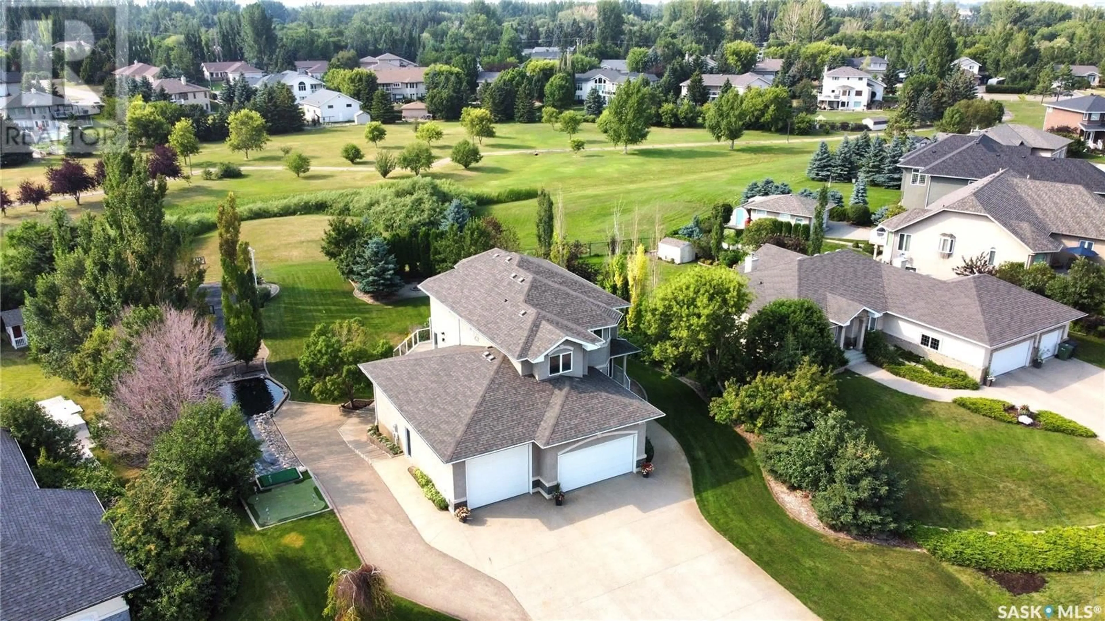 A pic from outside/outdoor area/front of a property/back of a property/a pic from drone, street for 14 Emerald RIDGE, White City Saskatchewan S4L5B1