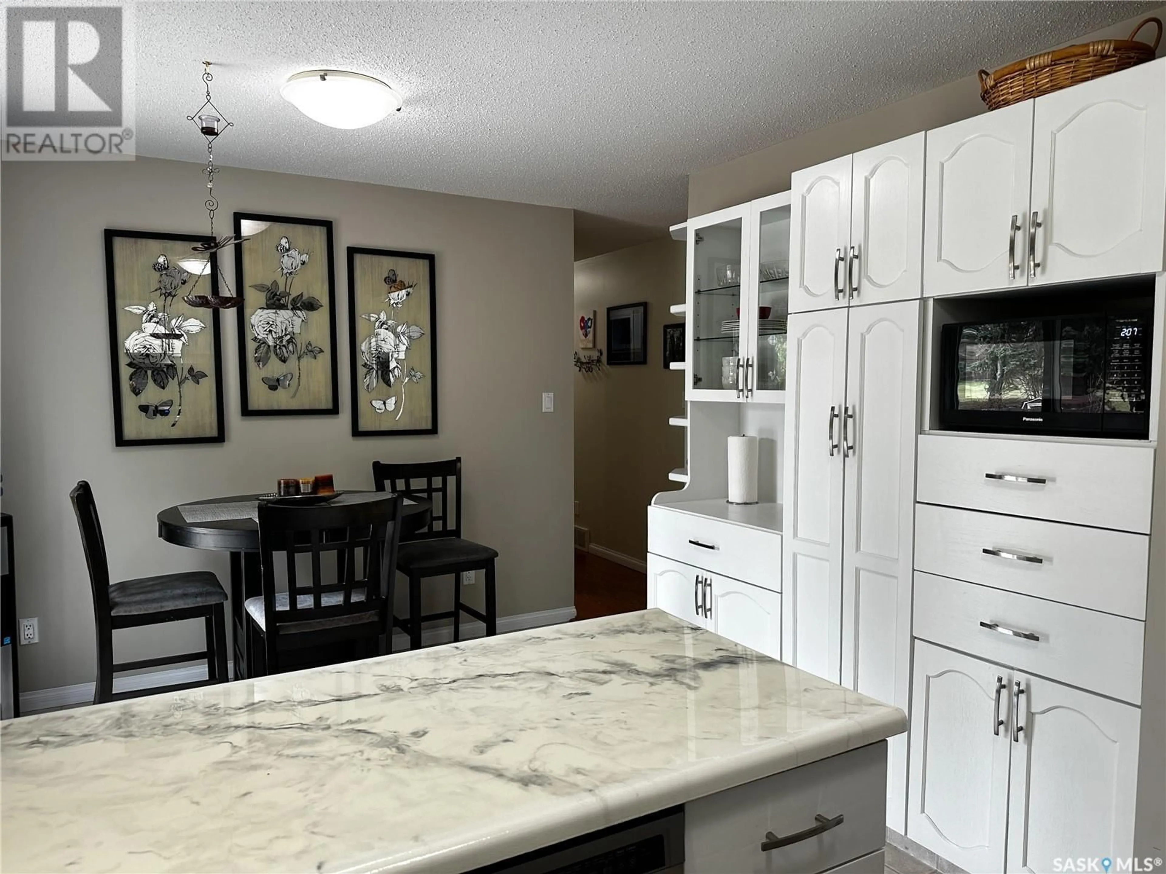 Open concept kitchen, ceramic/tile floor for 11226 Gardiner DRIVE, North Battleford Saskatchewan S9A3M6