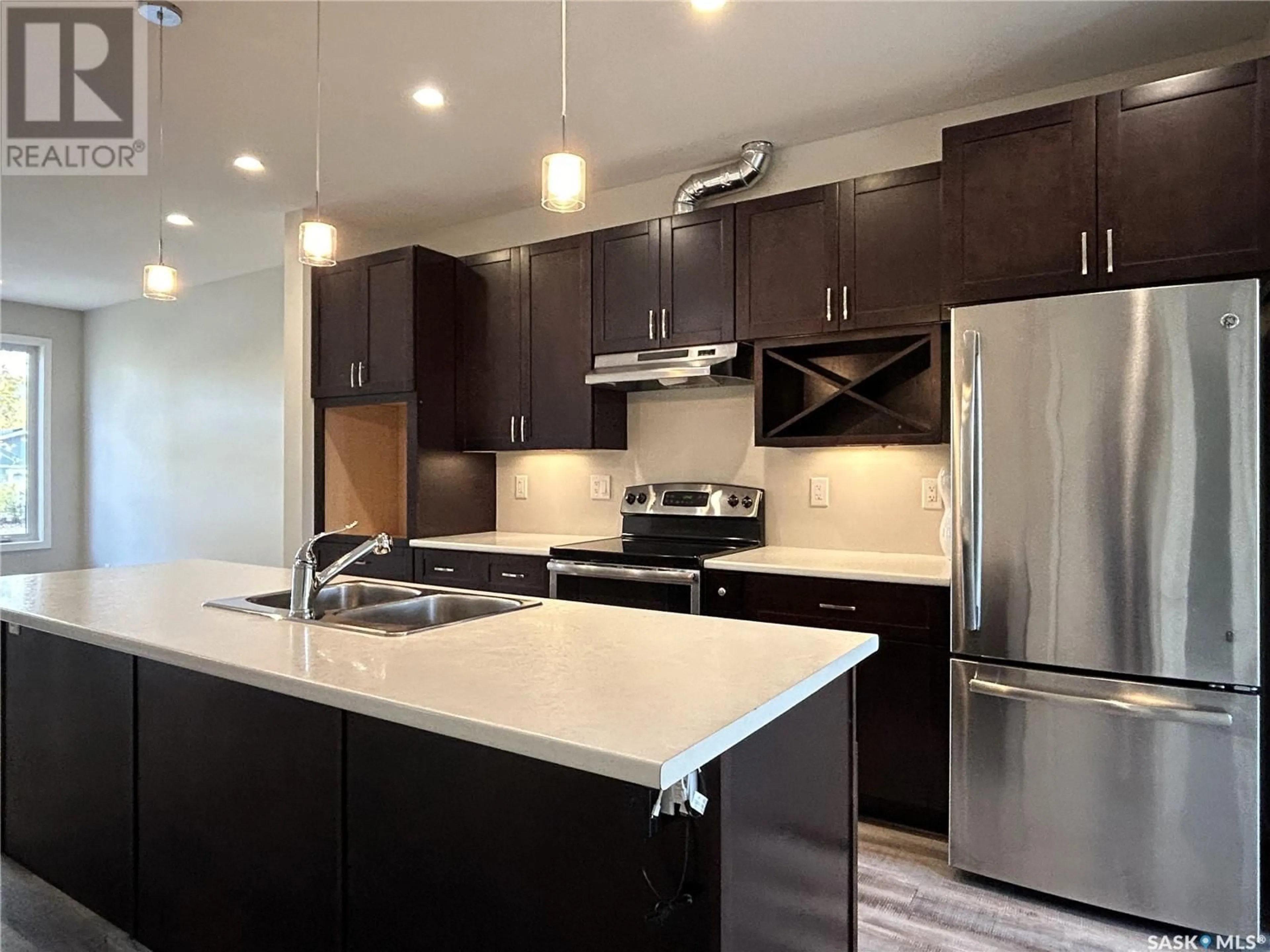 Open concept kitchen, unknown for 1317 8th AVENUE N, Saskatoon Saskatchewan S7K2X5