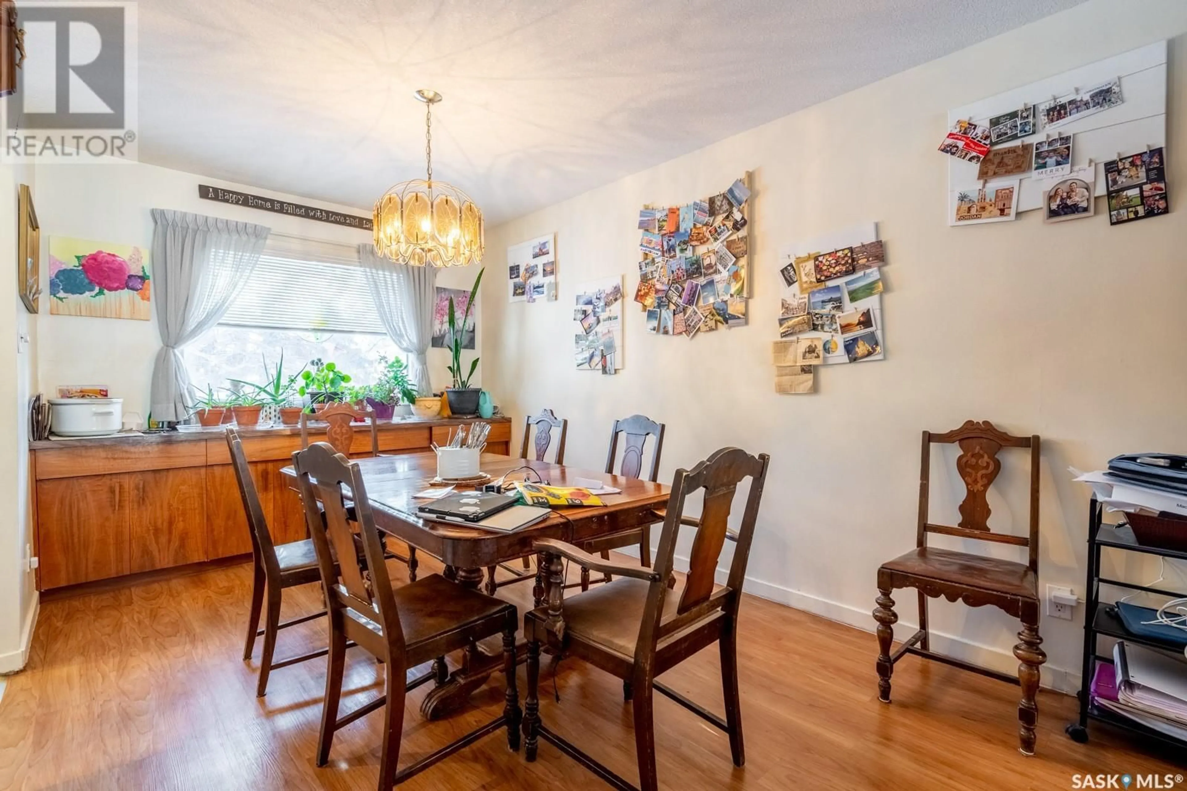 Dining room, wood/laminate floor for 109 Simpson ROAD, Regina Saskatchewan S4S2Y8