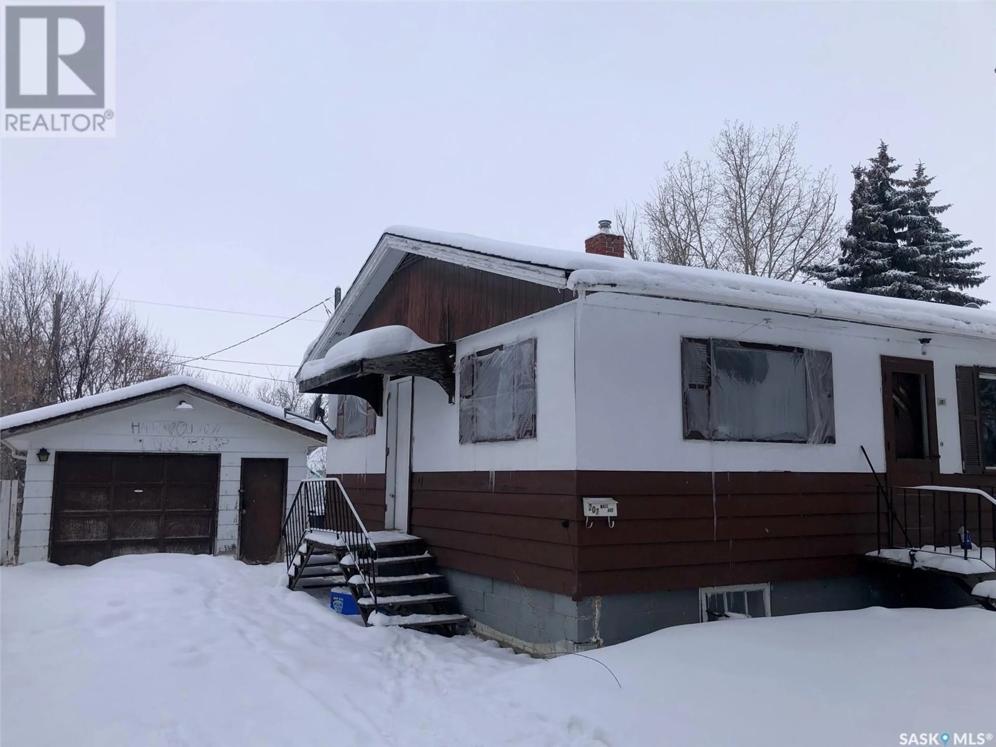 Home with vinyl exterior material, street for 207 Wall AVENUE, Kamsack Saskatchewan S0A1S0