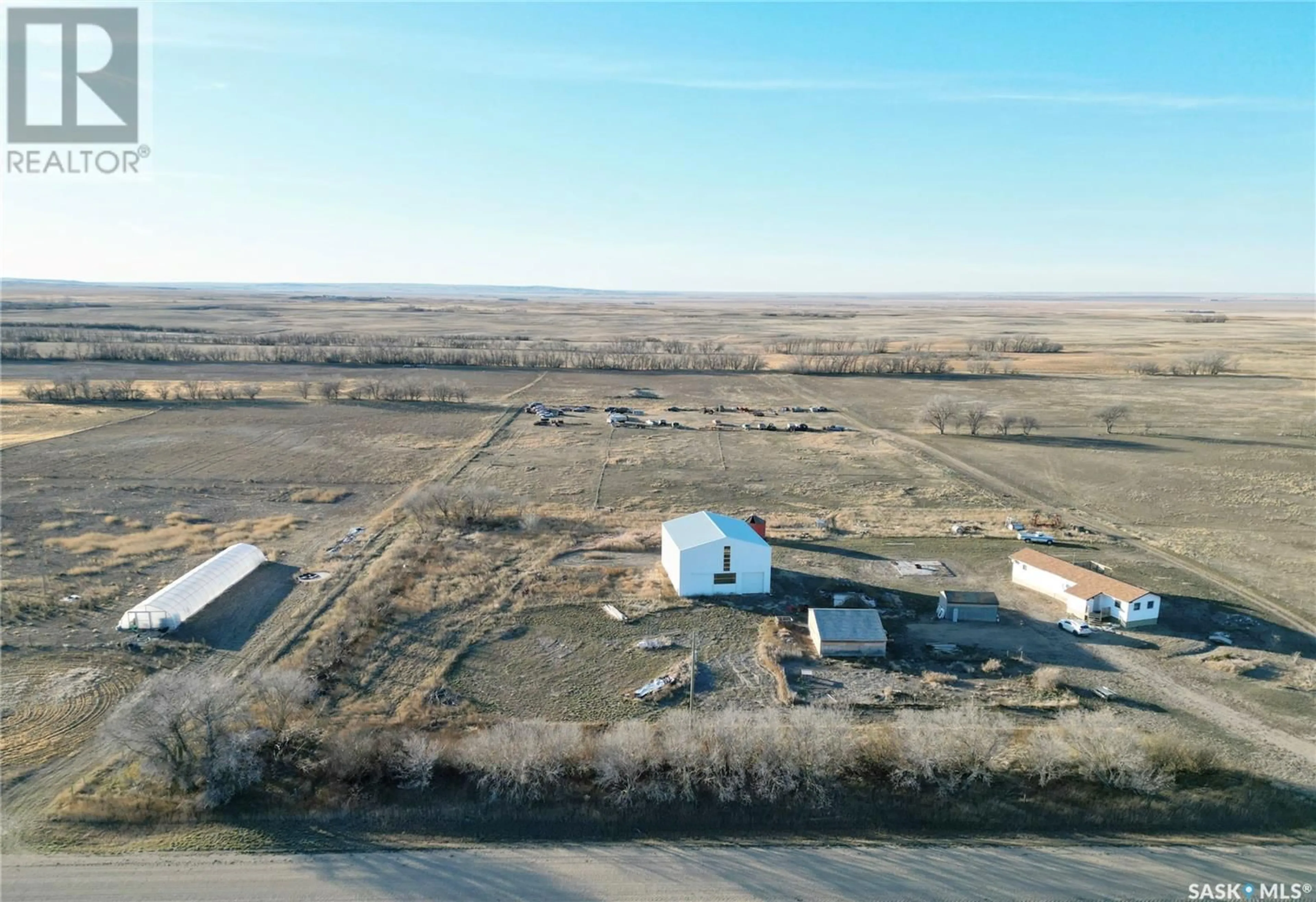 A pic from outside/outdoor area/front of a property/back of a property/a pic from drone, building for Wiseton Acreage, King George Rm No. 256 Saskatchewan S0L3M0