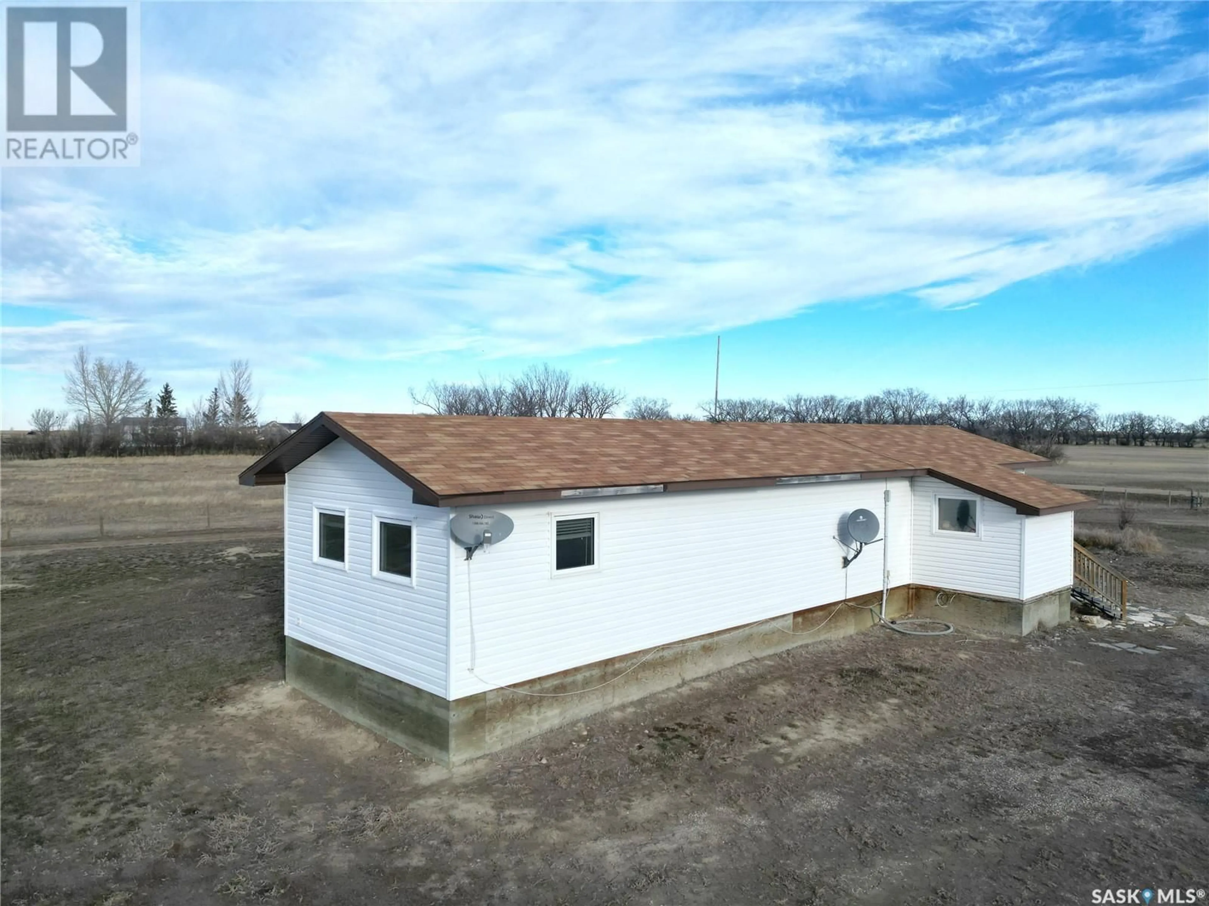 A pic from outside/outdoor area/front of a property/back of a property/a pic from drone, building for Wiseton Acreage, King George Rm No. 256 Saskatchewan S0L3M0