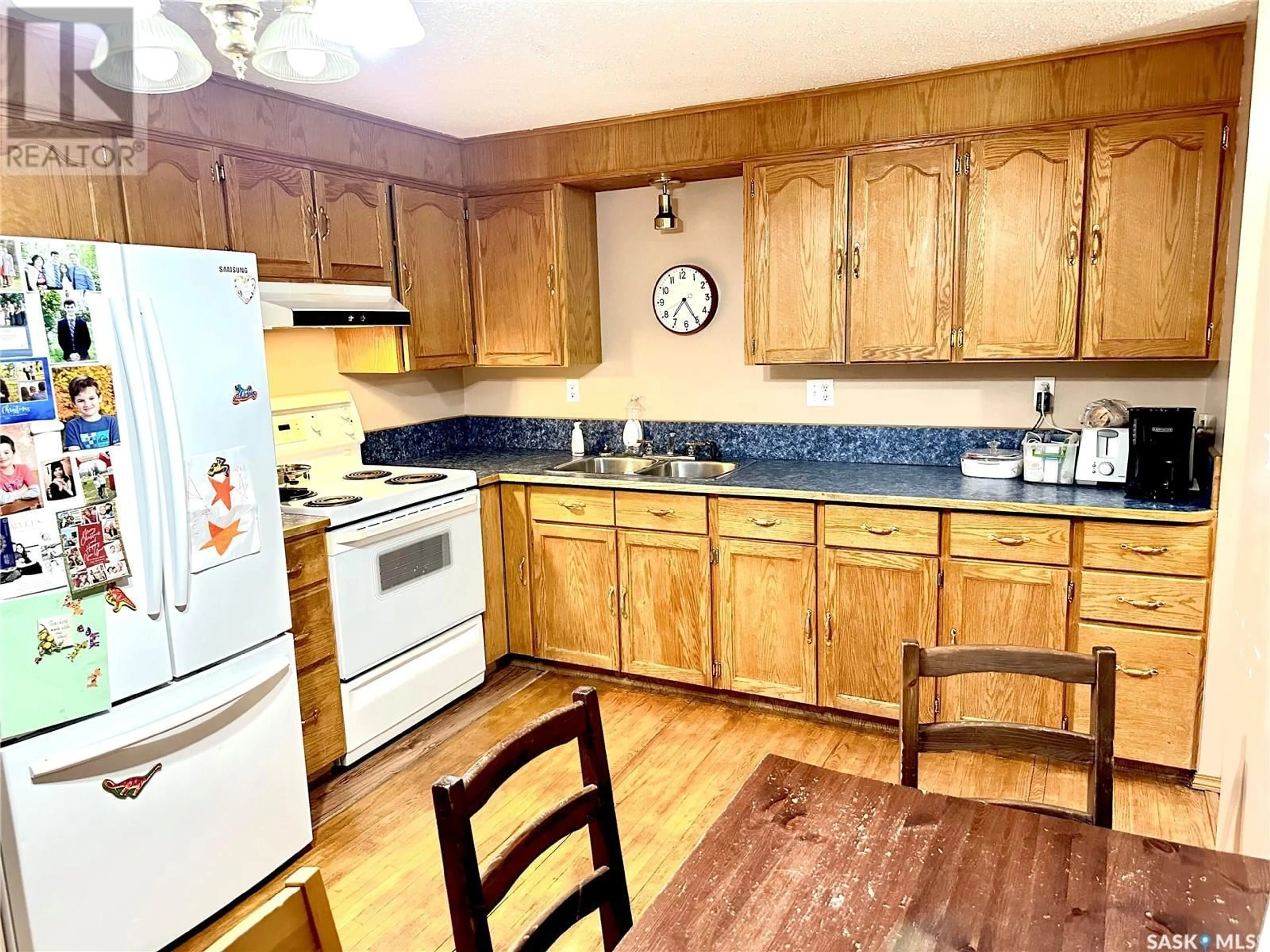 Standard kitchen, wood/laminate floor for 30 1st STREET W, Birch Hills Saskatchewan S0J0G0