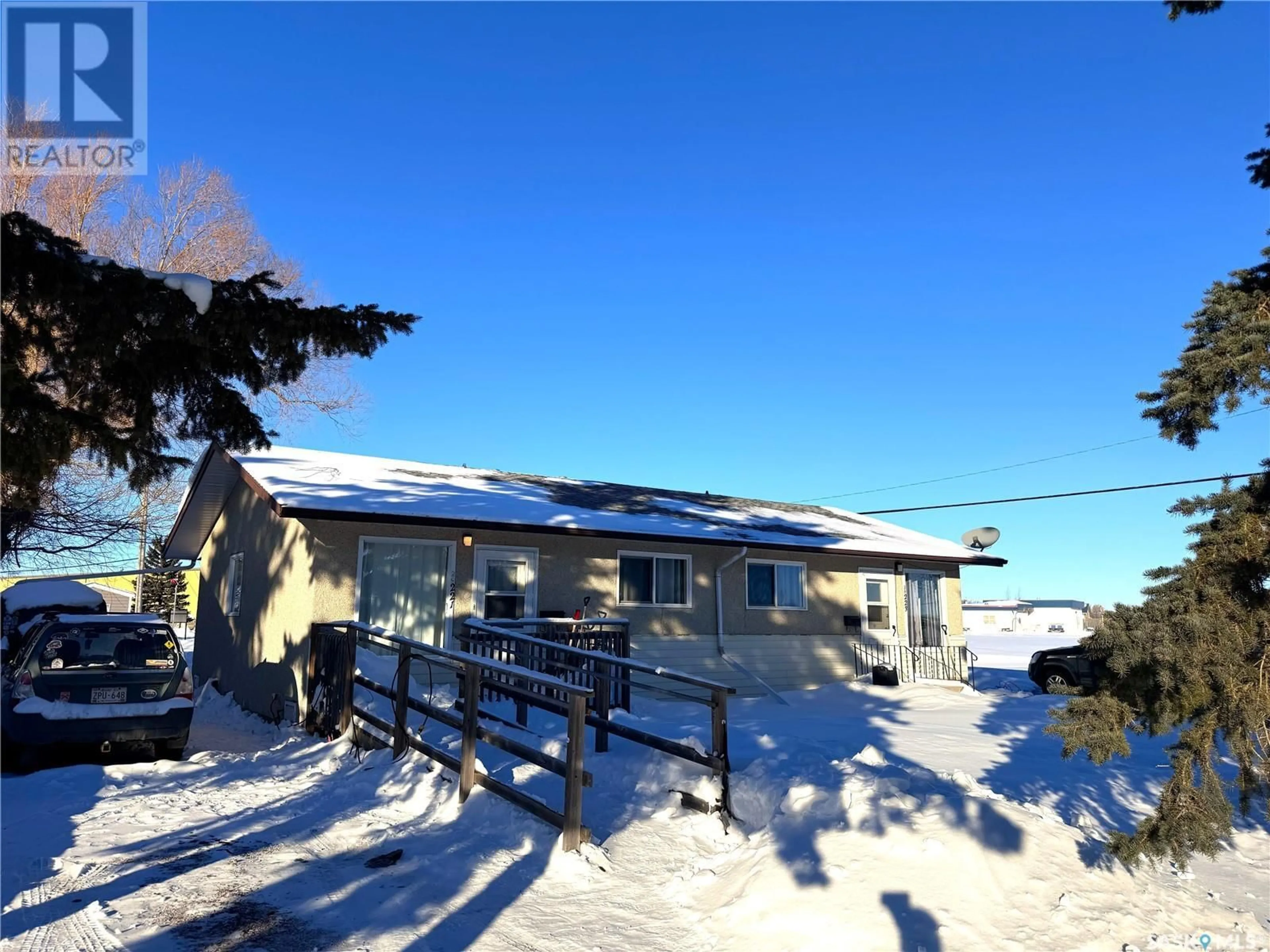 A pic from outside/outdoor area/front of a property/back of a property/a pic from drone, street for 221 & 223 4th STREET NE, Watson Saskatchewan S0K4V0