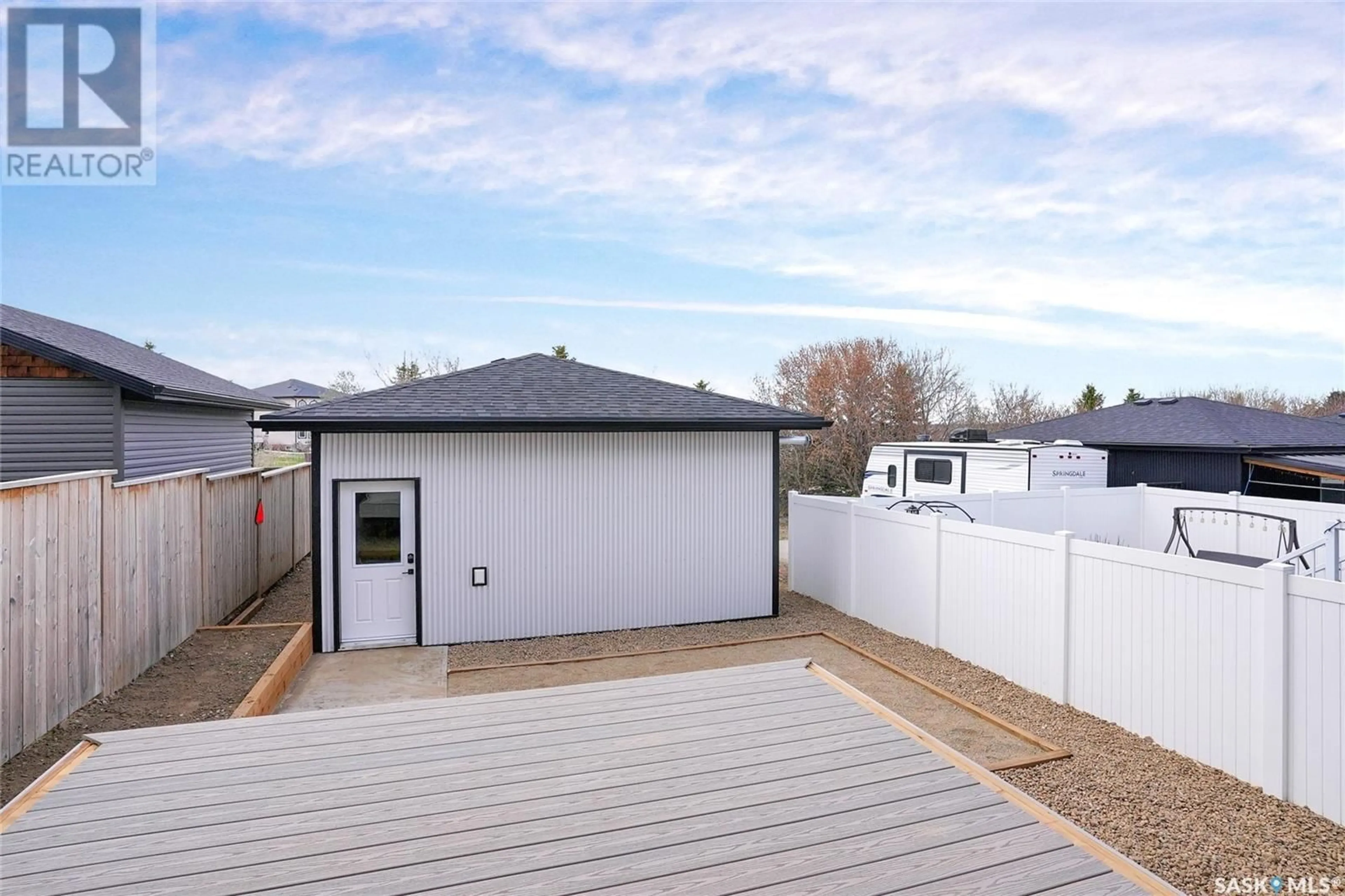 A pic from outside/outdoor area/front of a property/back of a property/a pic from drone, street for 48 BRIGHAM ROAD, Moose Jaw Saskatchewan S6K0A7
