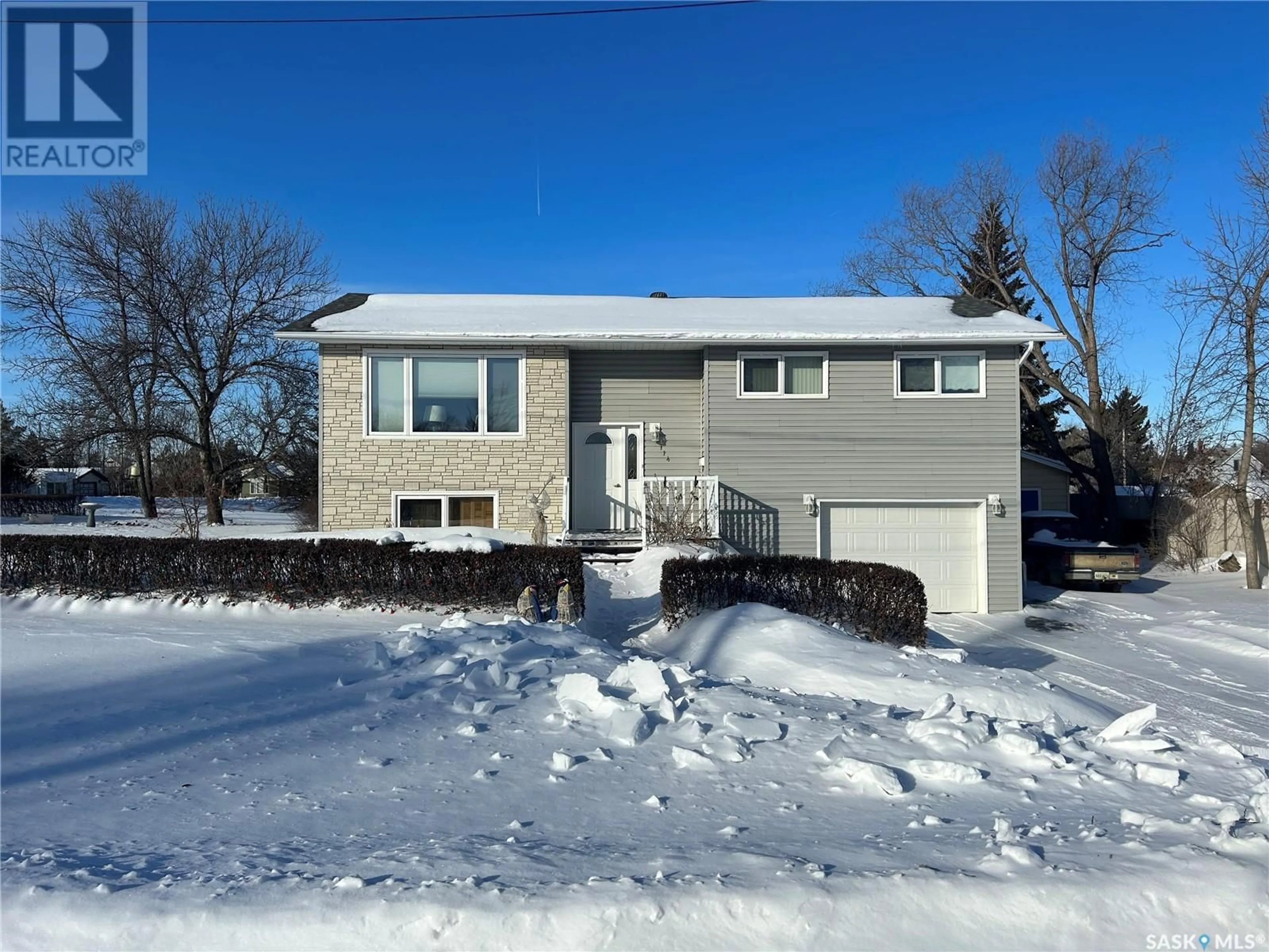 Home with vinyl exterior material, street for 114 Pine STREET, Wolseley Saskatchewan S0G5H0