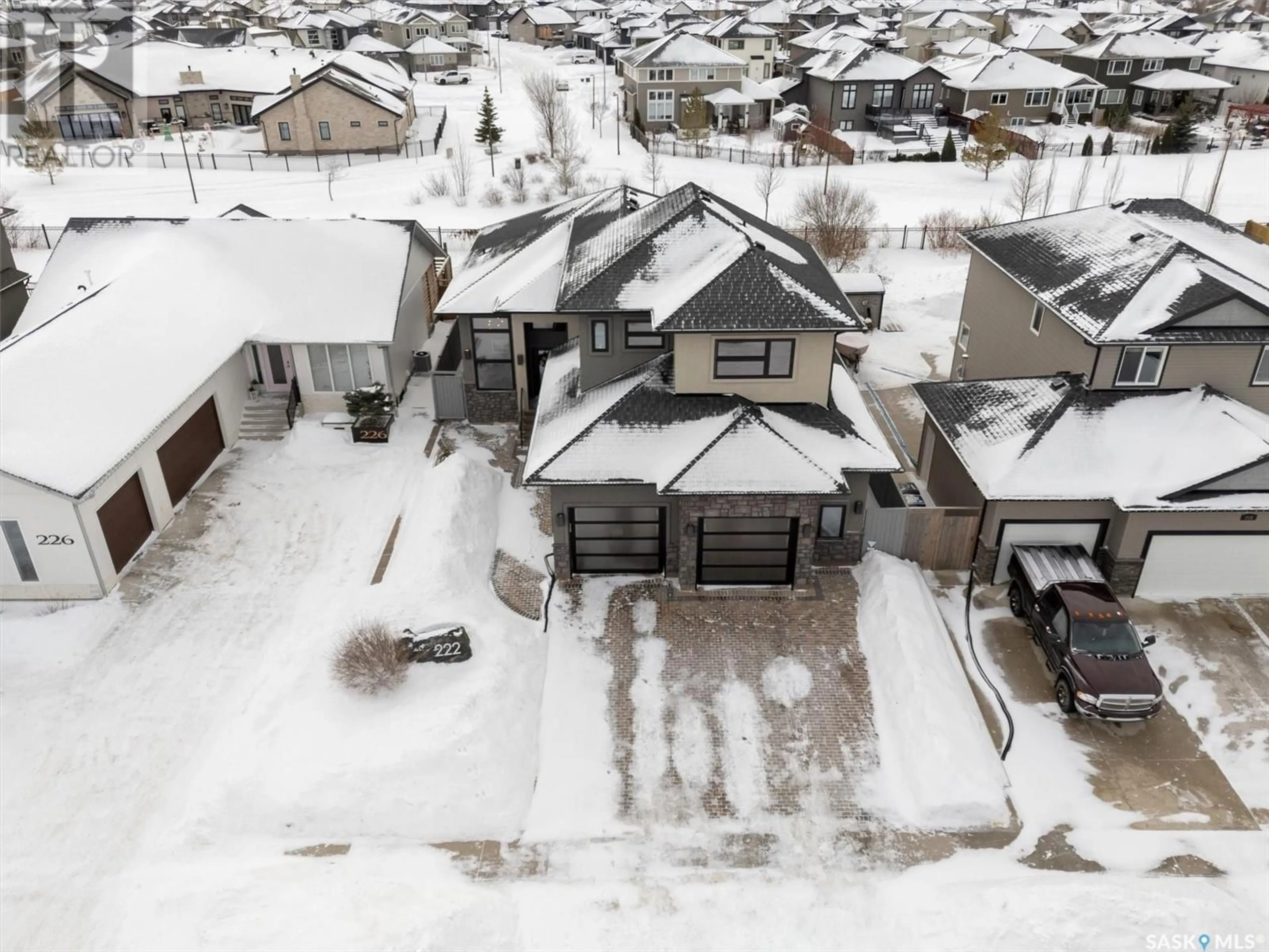 A pic from outside/outdoor area/front of a property/back of a property/a pic from drone, street for 222 Werschner CRESCENT, Saskatoon Saskatchewan S7V0C9