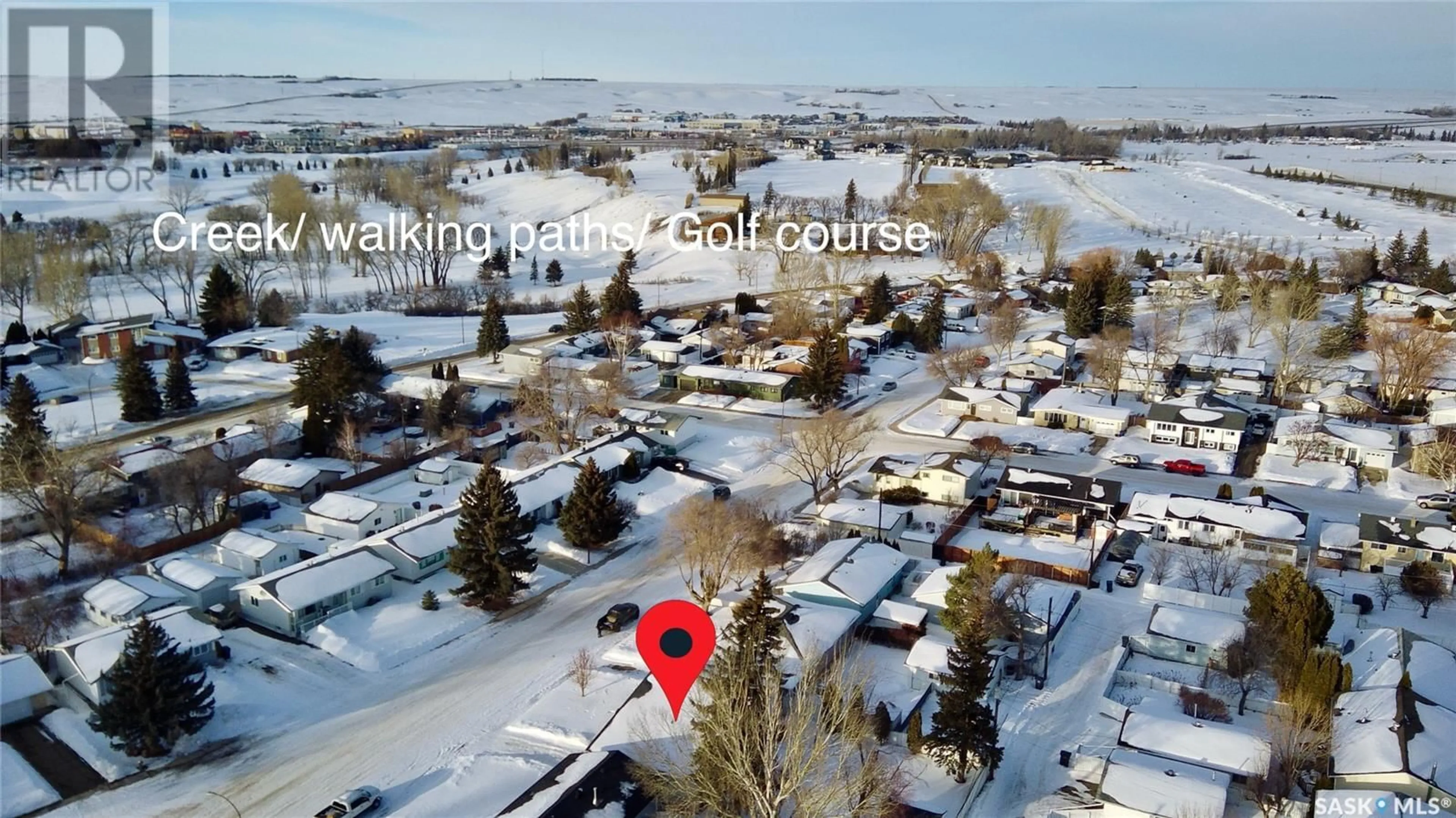 A pic from outside/outdoor area/front of a property/back of a property/a pic from drone, unknown for 78 Macdonald CRESCENT, Swift Current Saskatchewan S9H1P4