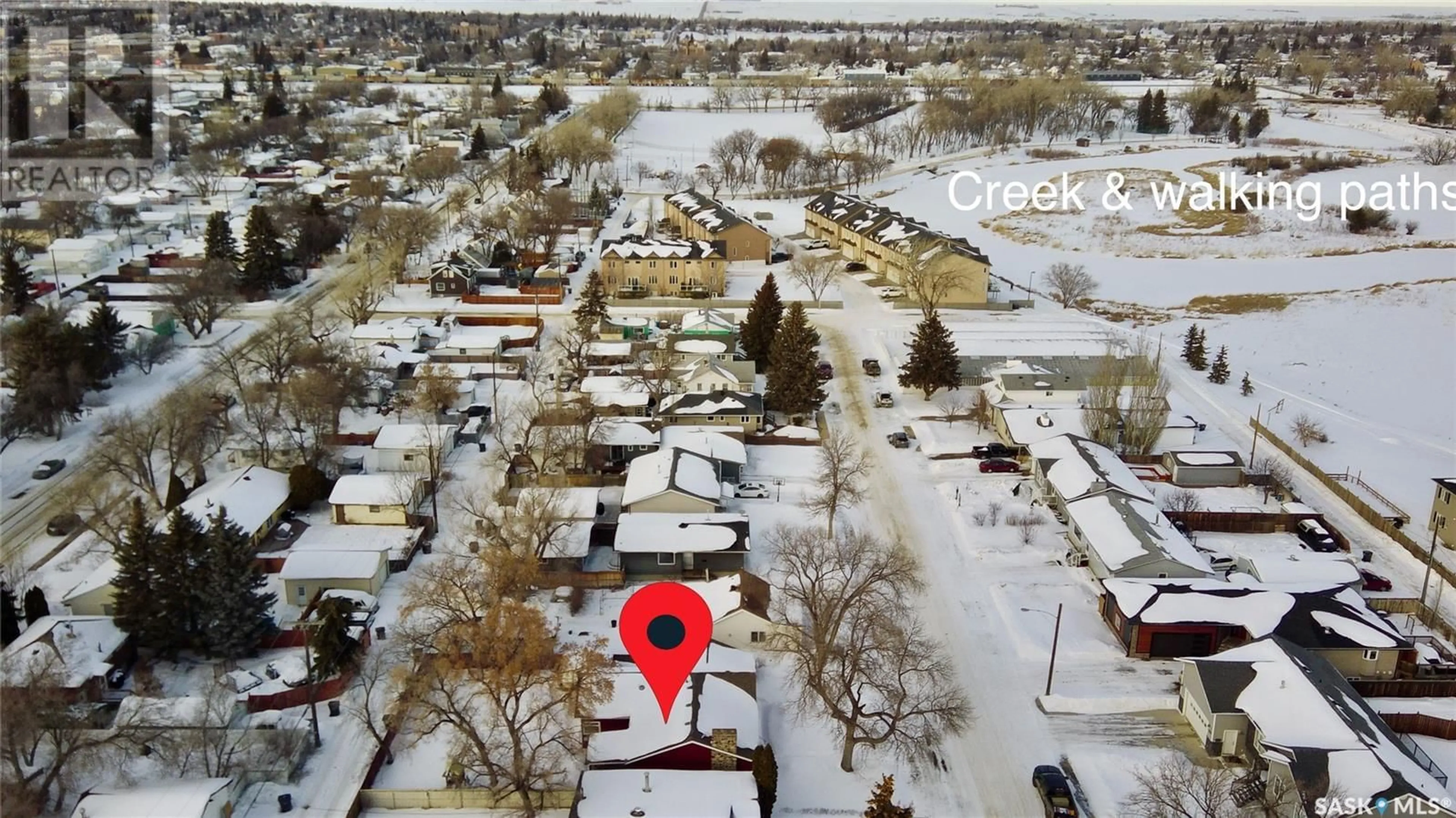 A pic from outside/outdoor area/front of a property/back of a property/a pic from drone, street for 358 7th AVENUE SE, Swift Current Saskatchewan S9H3P7