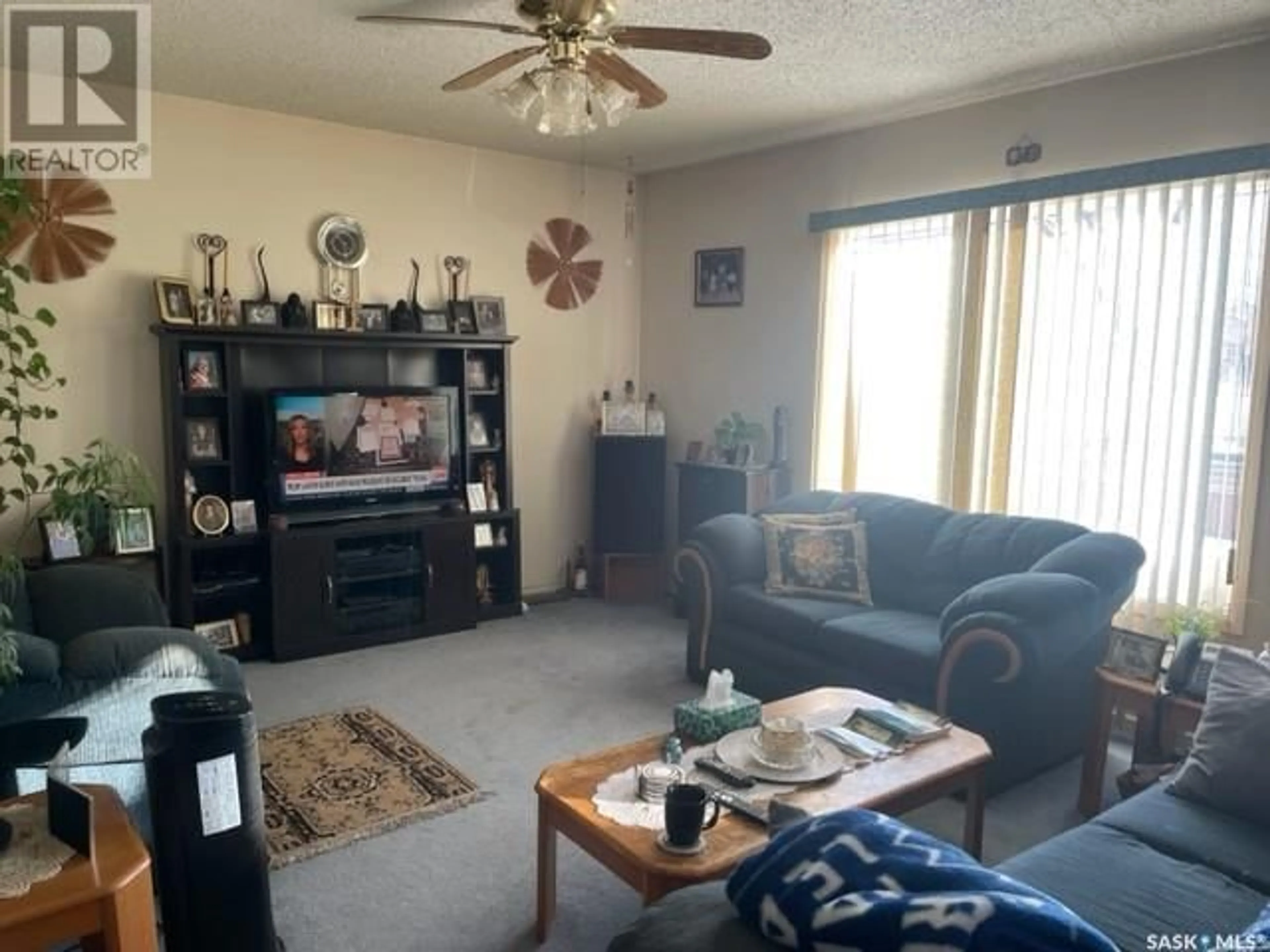 Living room with furniture, unknown for 1581 101st STREET, North Battleford Saskatchewan S9A1A3