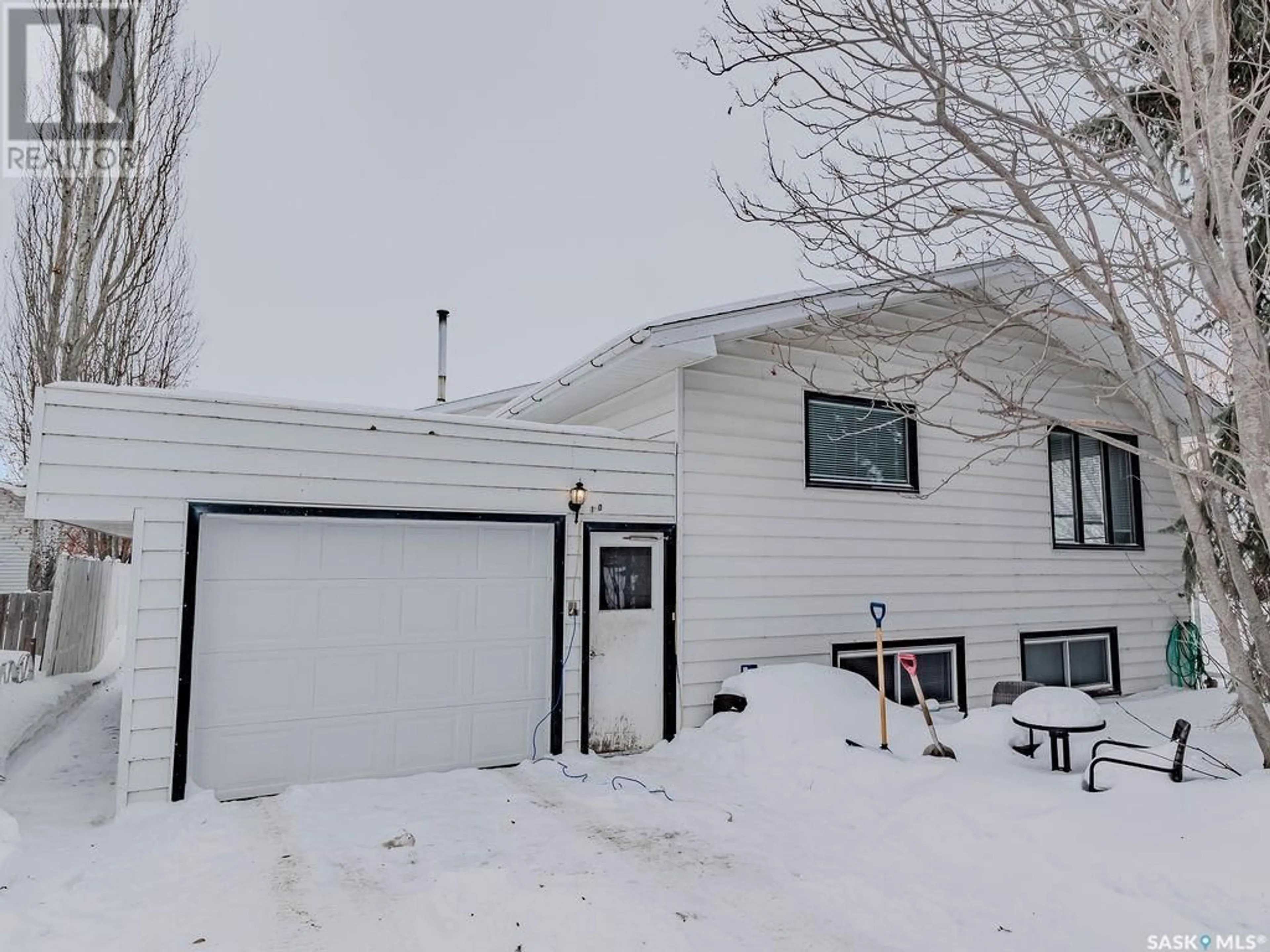 Home with vinyl exterior material, street for 803 1ST AVENUE, Humboldt Saskatchewan S0K2A0