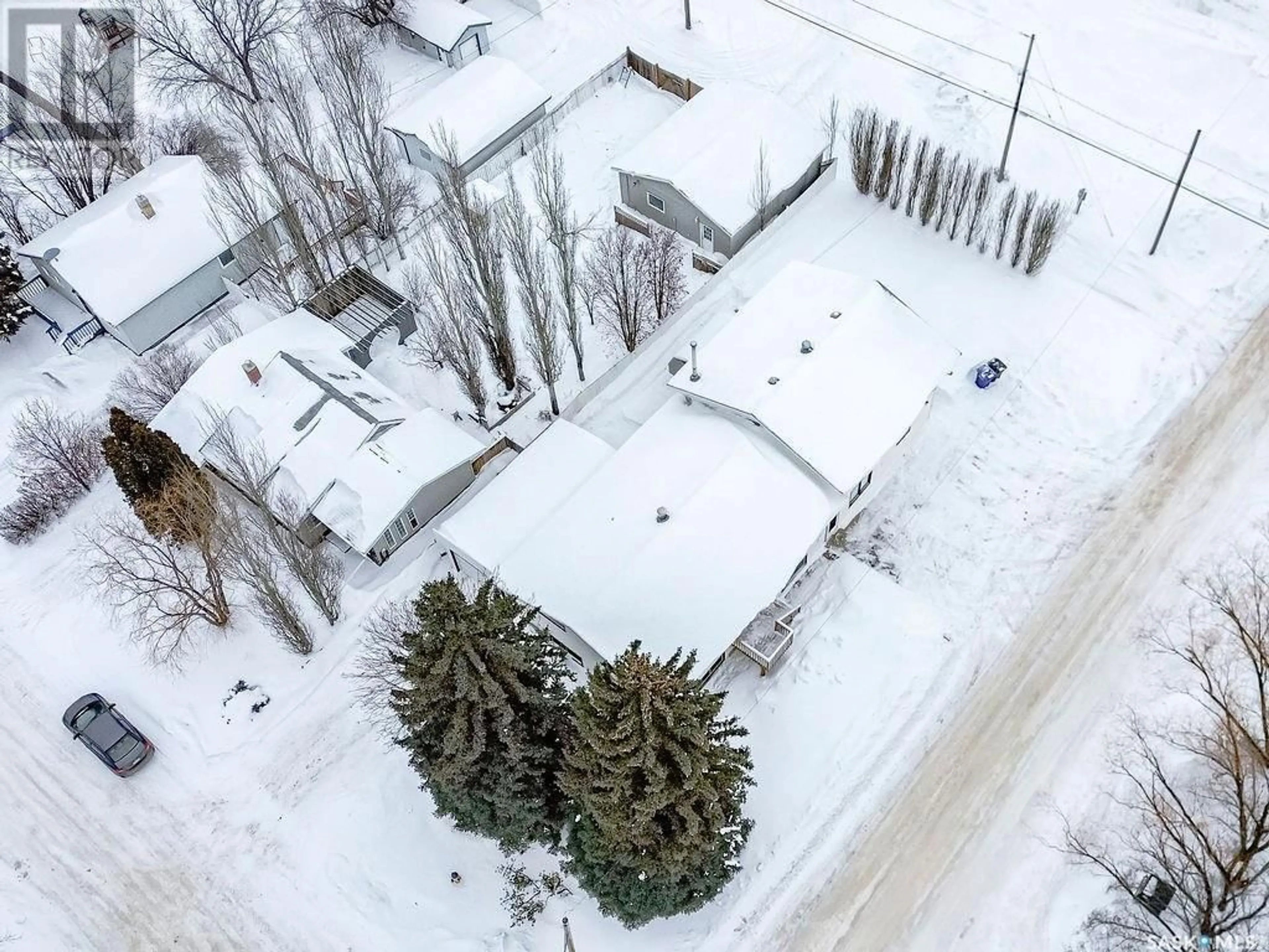 A pic from outside/outdoor area/front of a property/back of a property/a pic from drone, street for 803 1ST AVENUE, Humboldt Saskatchewan S0K2A0