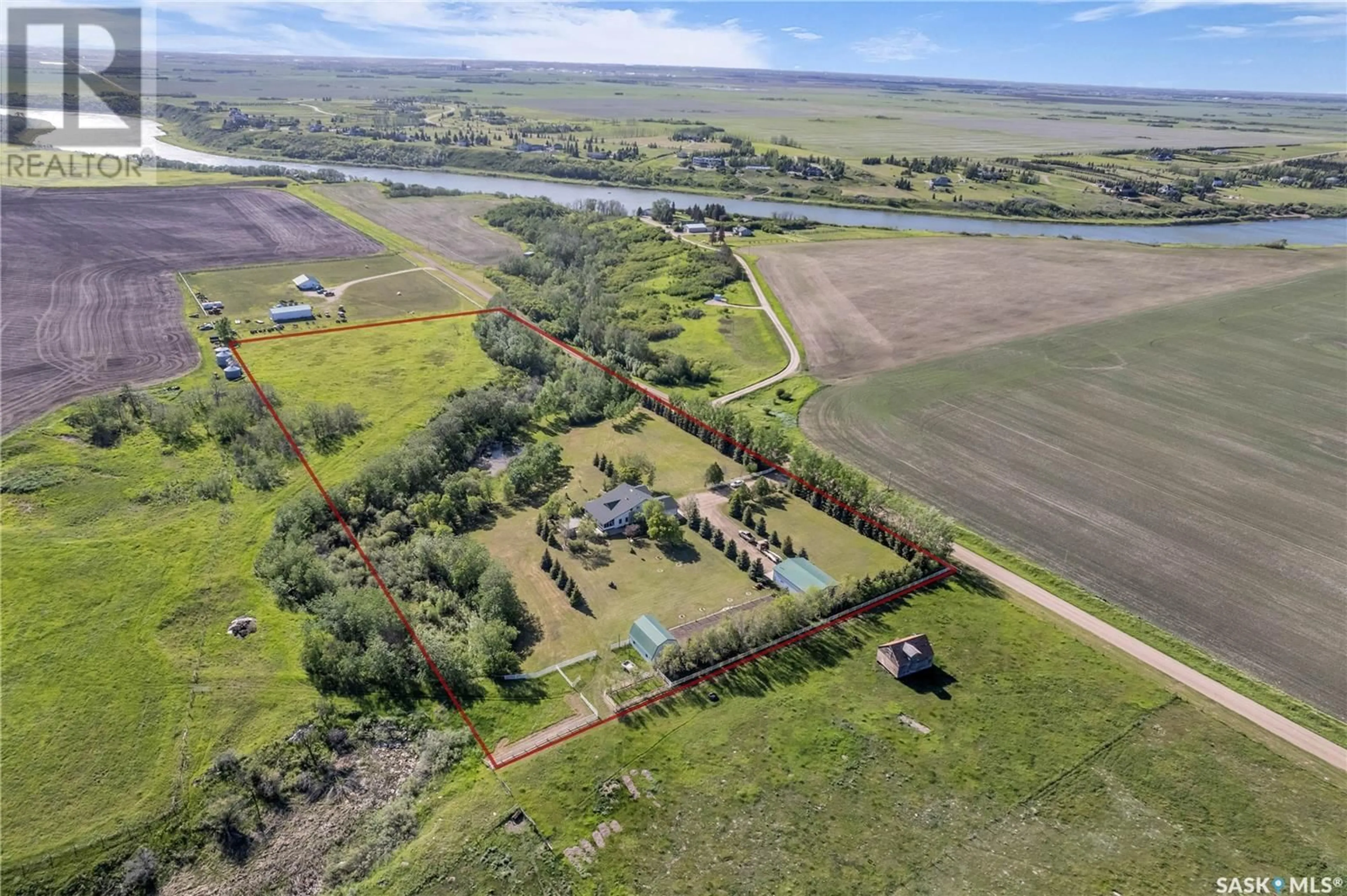 A pic from outside/outdoor area/front of a property/back of a property/a pic from drone, water/lake/river/ocean view for Pomedli Acreage, Corman Park Rm No. 344 Saskatchewan S7K3J9