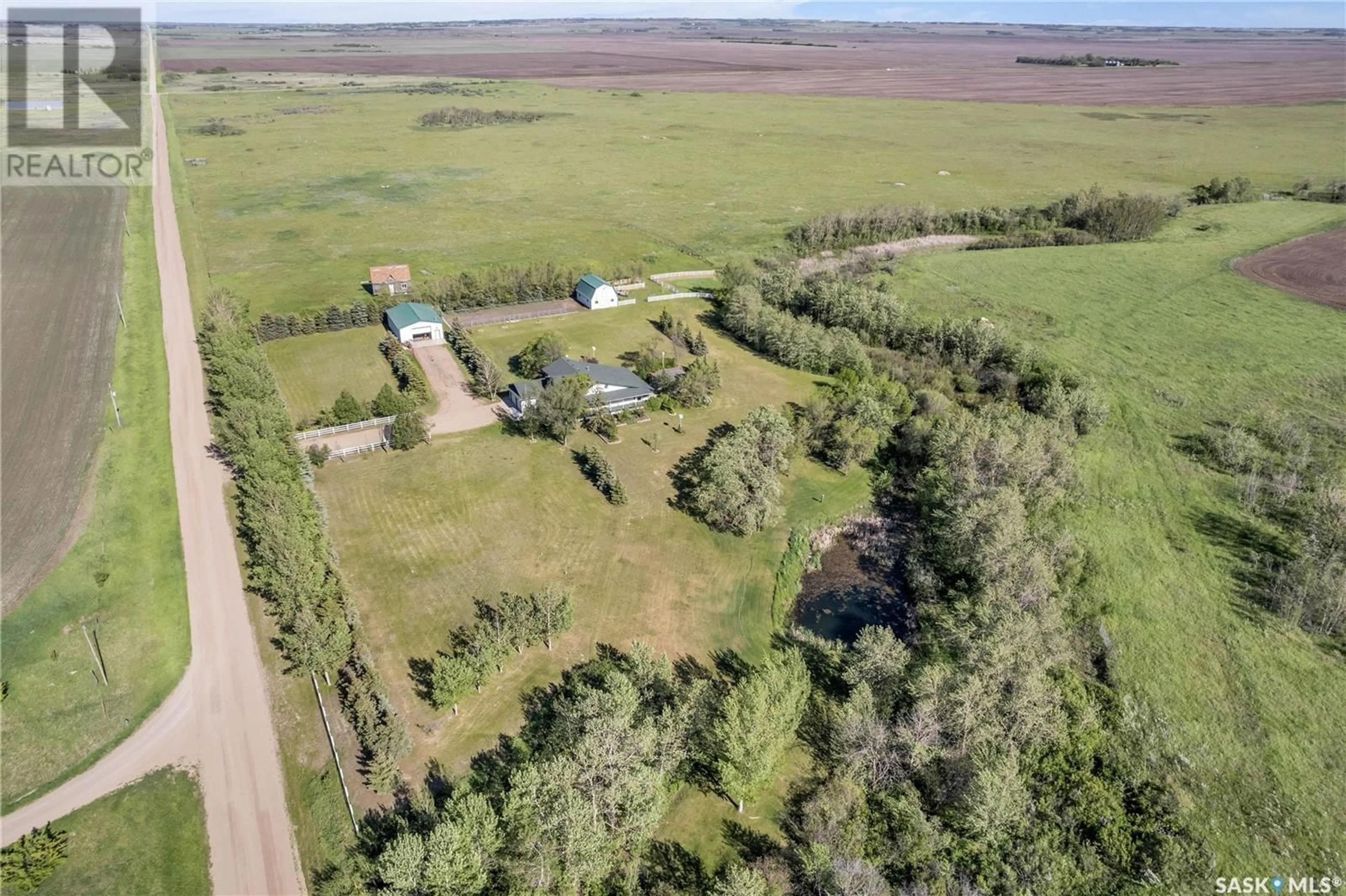 A pic from outside/outdoor area/front of a property/back of a property/a pic from drone, unknown for Pomedli Acreage, Corman Park Rm No. 344 Saskatchewan S7K3J9