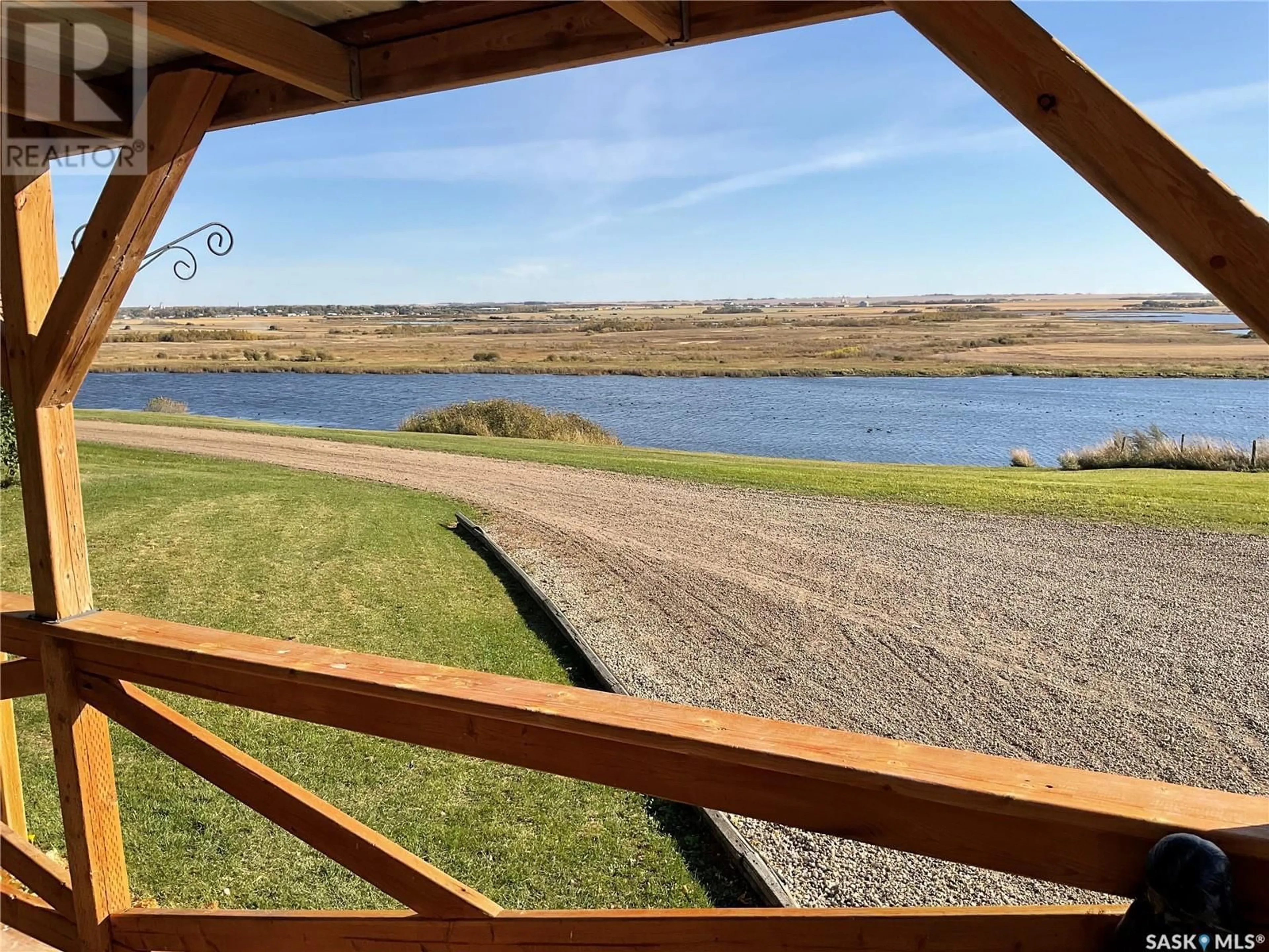 A pic from outside/outdoor area/front of a property/back of a property/a pic from drone, water/lake/river/ocean view for HAUSSECKER ACREAGE, Fish Creek Rm No. 402 Saskatchewan S0K4P0