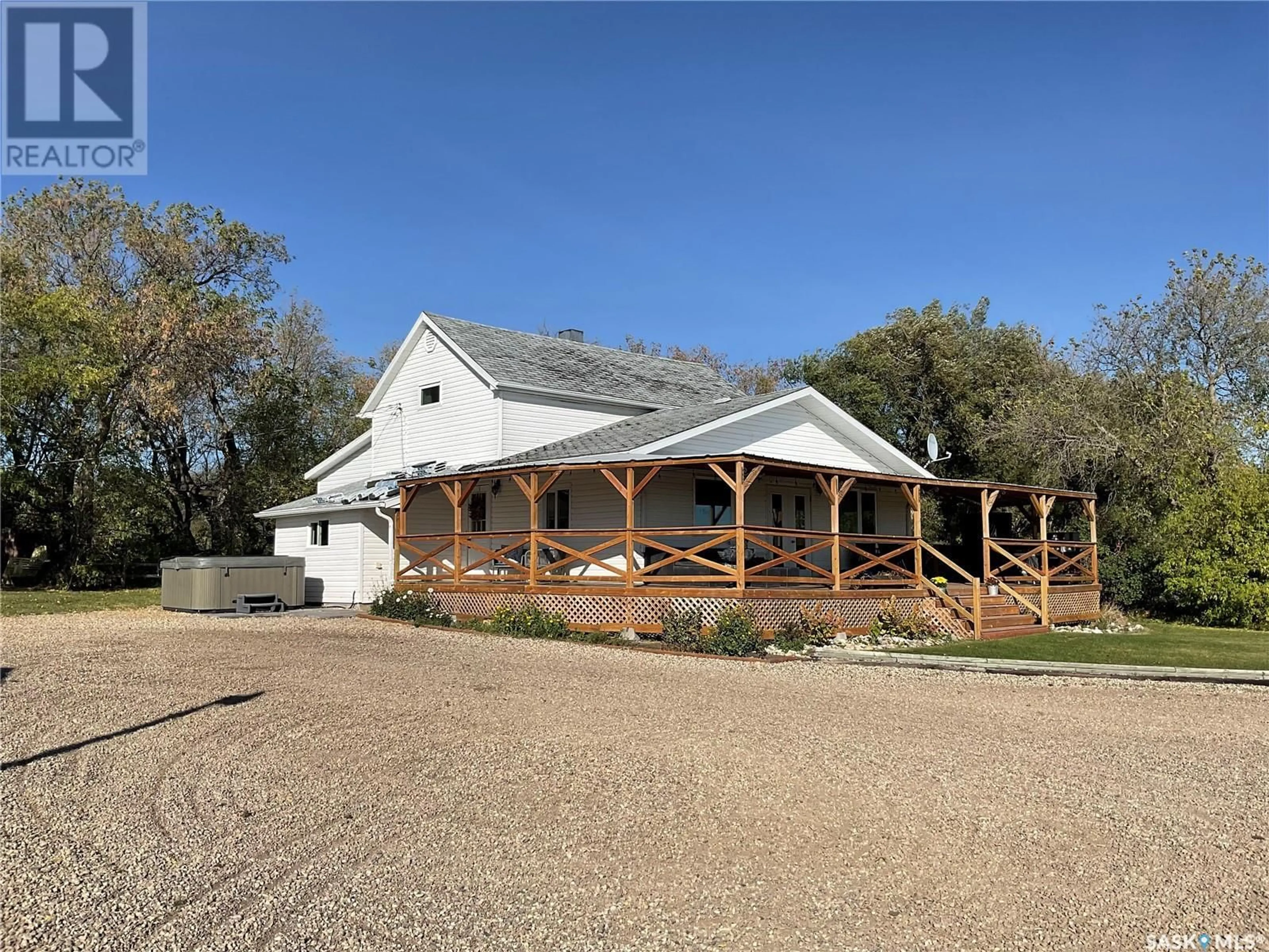 A pic from outside/outdoor area/front of a property/back of a property/a pic from drone, building for Haussecker acreage, Fish Creek Rm No. 402 Saskatchewan S0K4P0