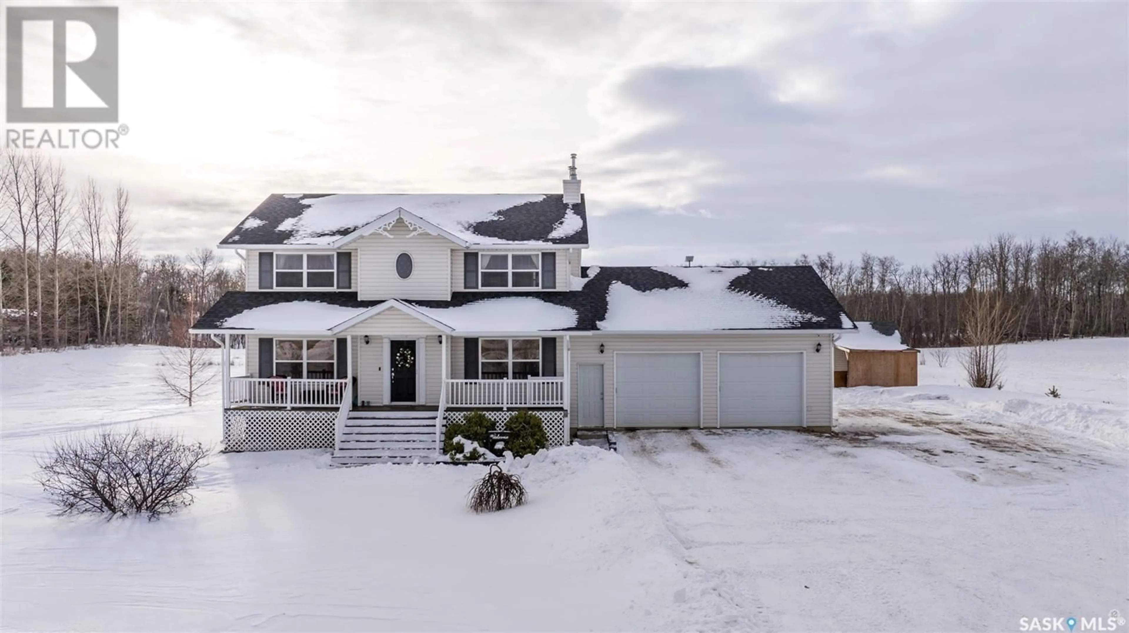 A pic from outside/outdoor area/front of a property/back of a property/a pic from drone, street for 1006 Silver Willow Road, Prince Albert Rm No. 461 Saskatchewan S6V5P9