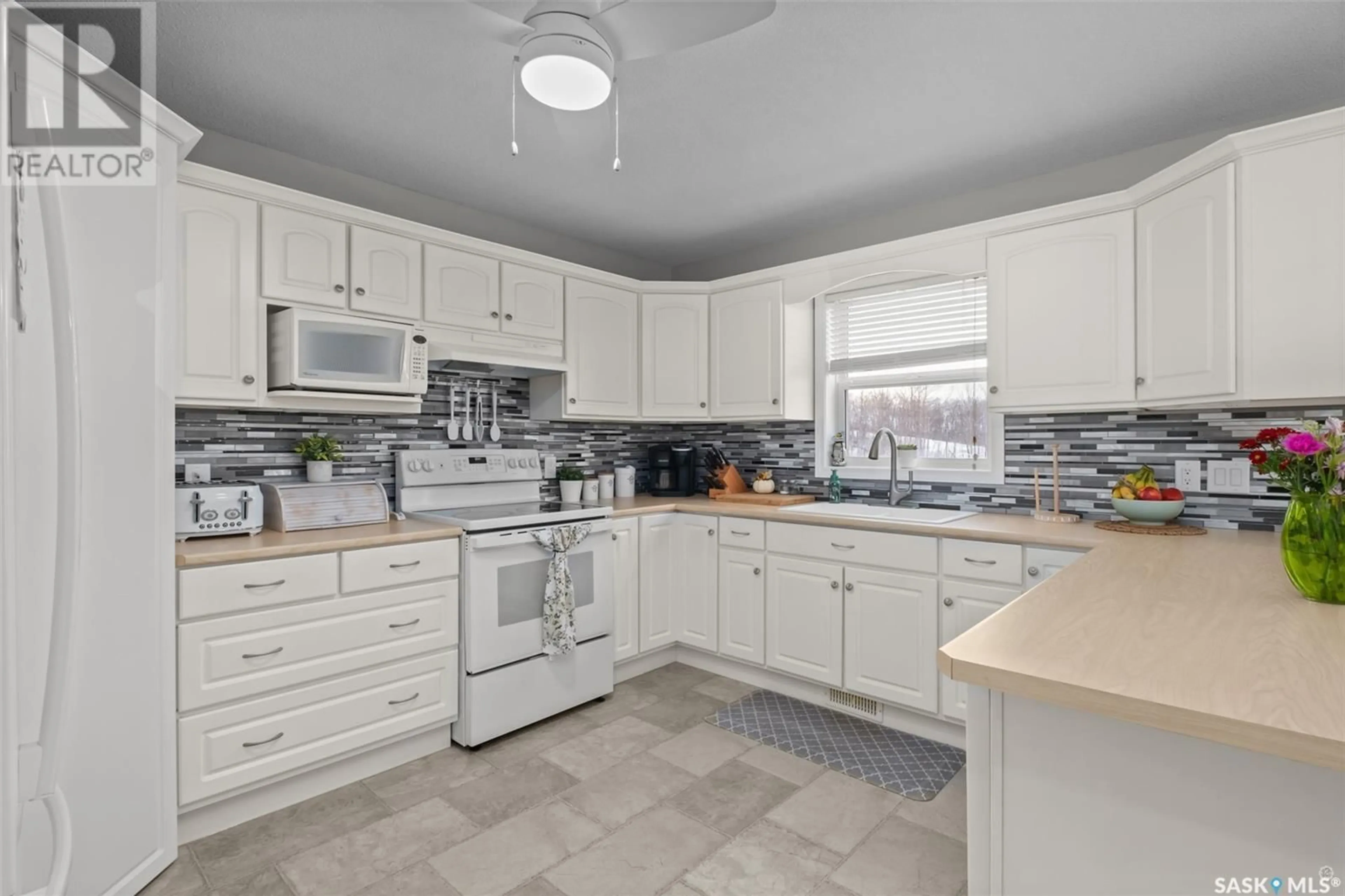 Standard kitchen, ceramic/tile floor for 1006 Silver Willow Road, Prince Albert Rm No. 461 Saskatchewan S6V5P9