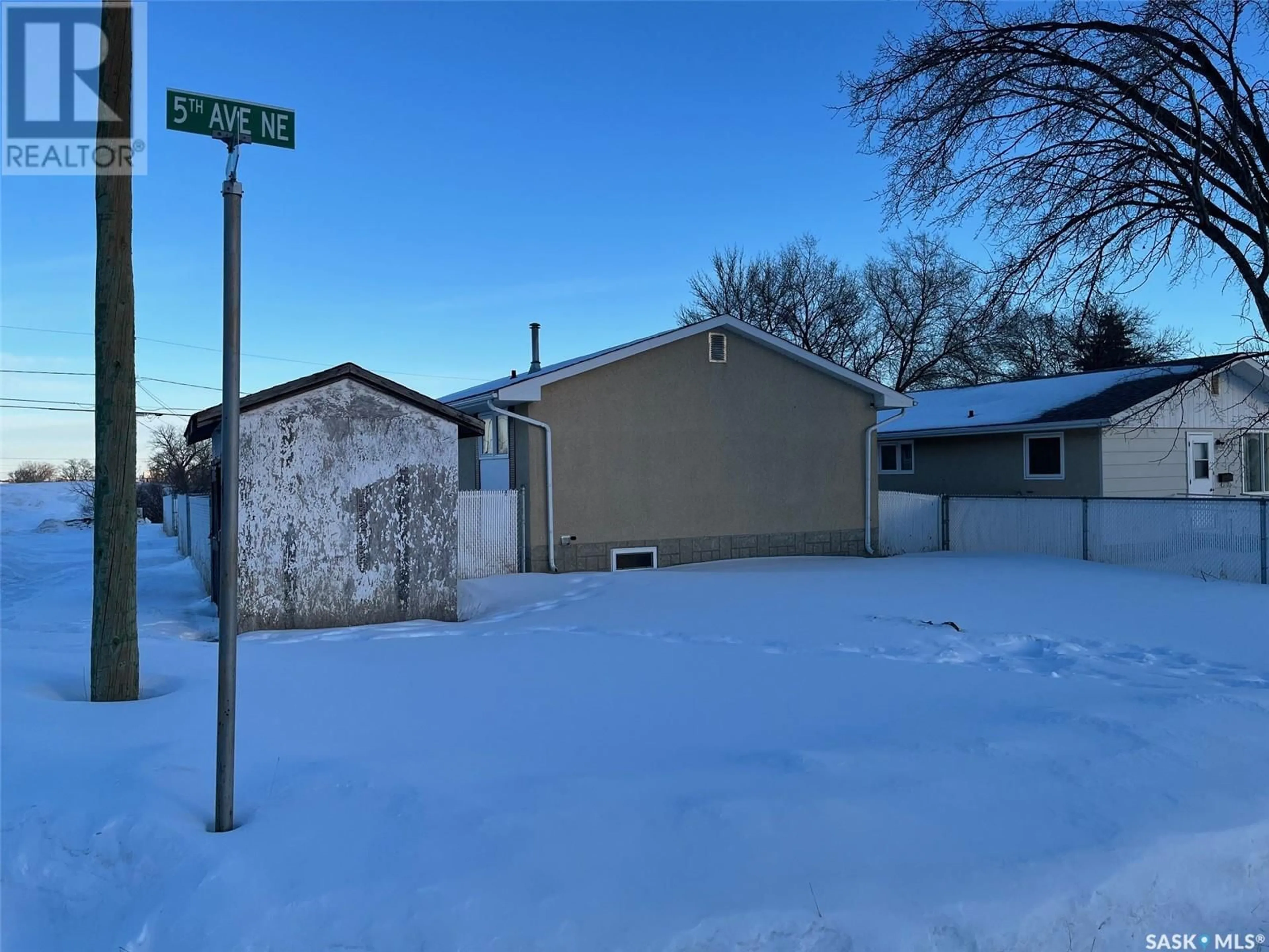 A pic from outside/outdoor area/front of a property/back of a property/a pic from drone, street for 503 Hall STREET E, Moose Jaw Saskatchewan S6H6L9