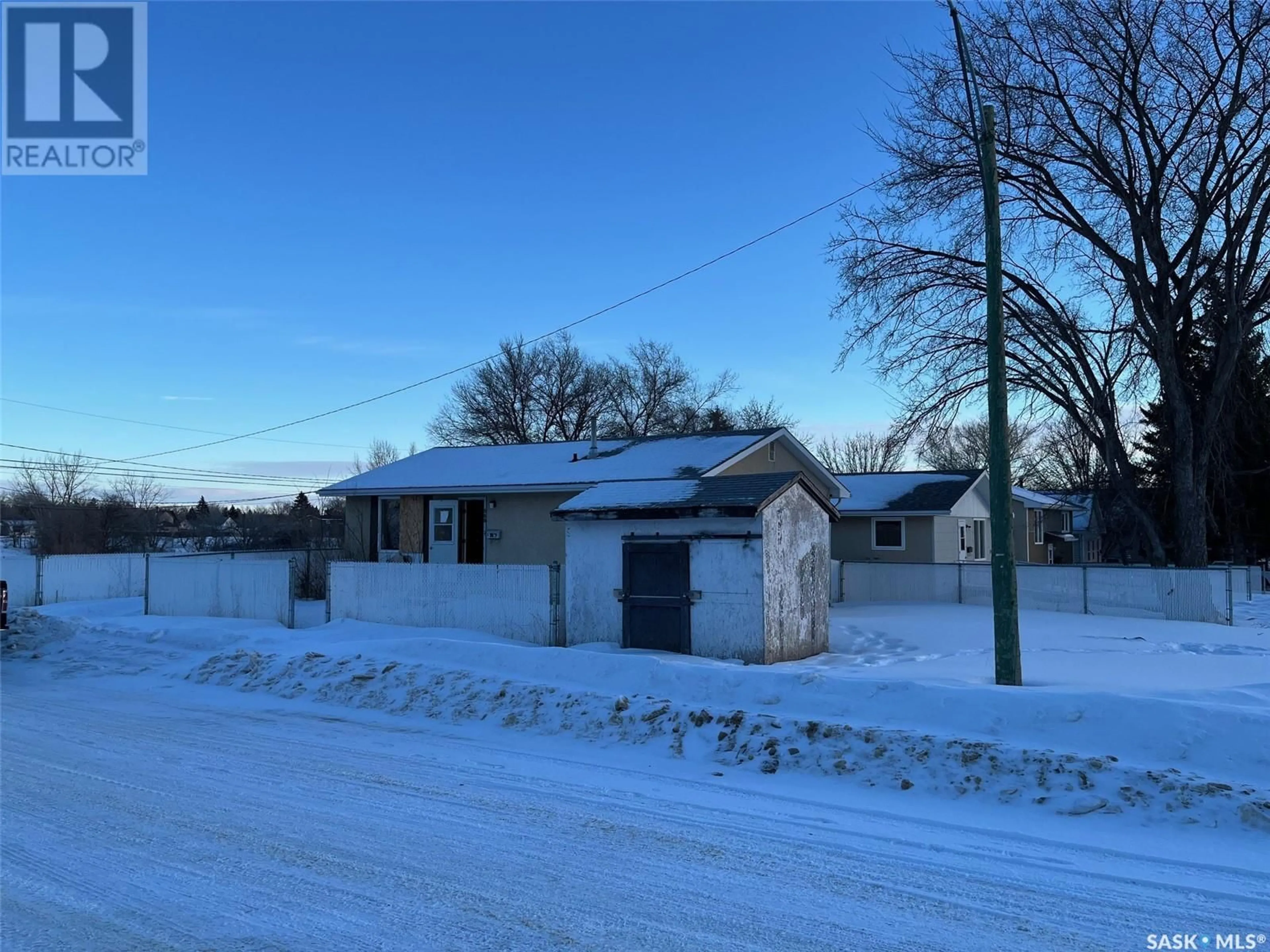 A pic from outside/outdoor area/front of a property/back of a property/a pic from drone, street for 503 Hall STREET E, Moose Jaw Saskatchewan S6H6L9