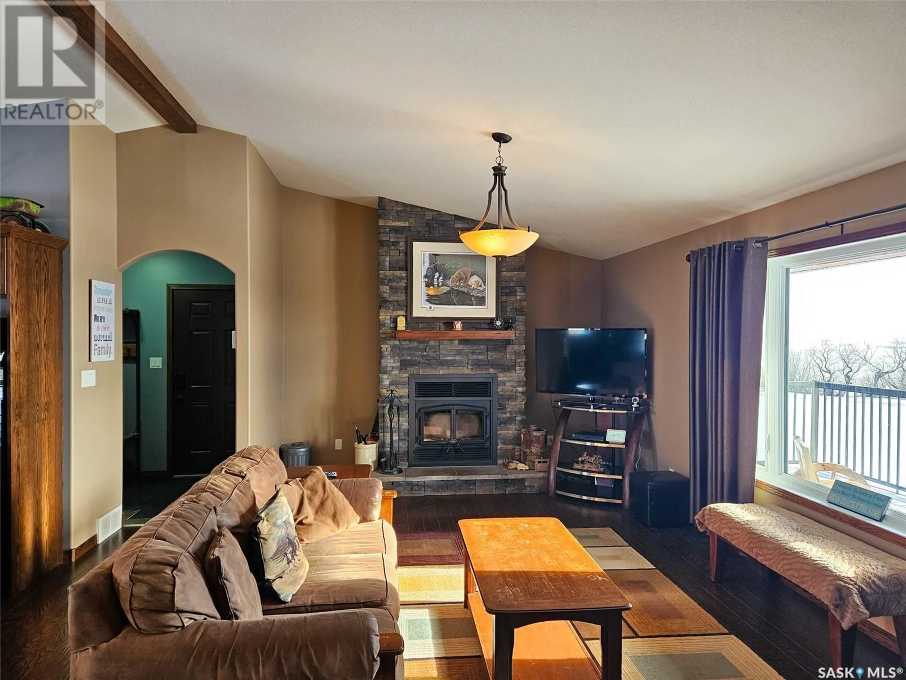 Living room with furniture, unknown for Chandler Acreage, Wood River Rm No. 74 Saskatchewan S0H2K0