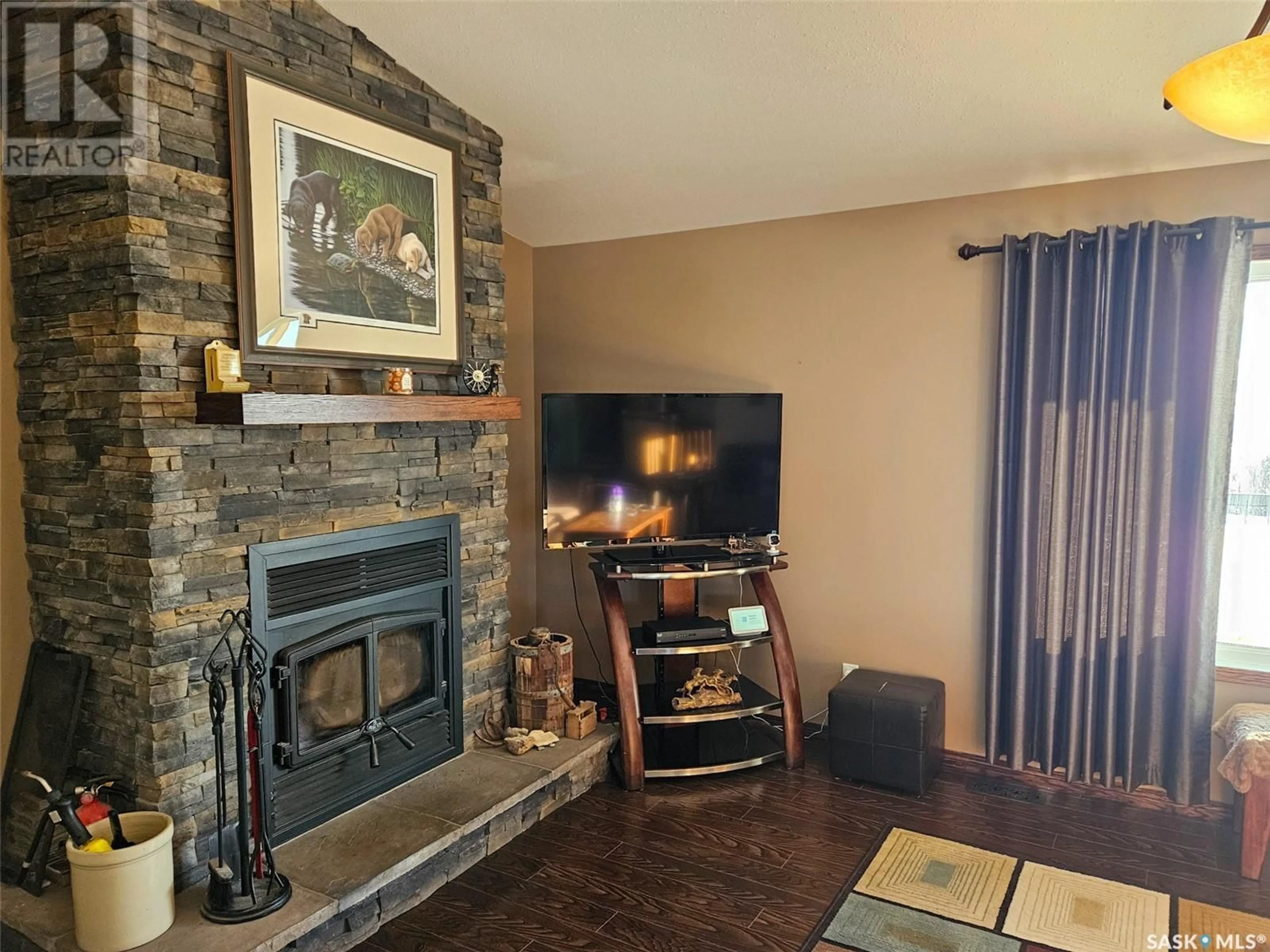 Living room with furniture, unknown for Chandler Acreage, Wood River Rm No. 74 Saskatchewan S0H2K0