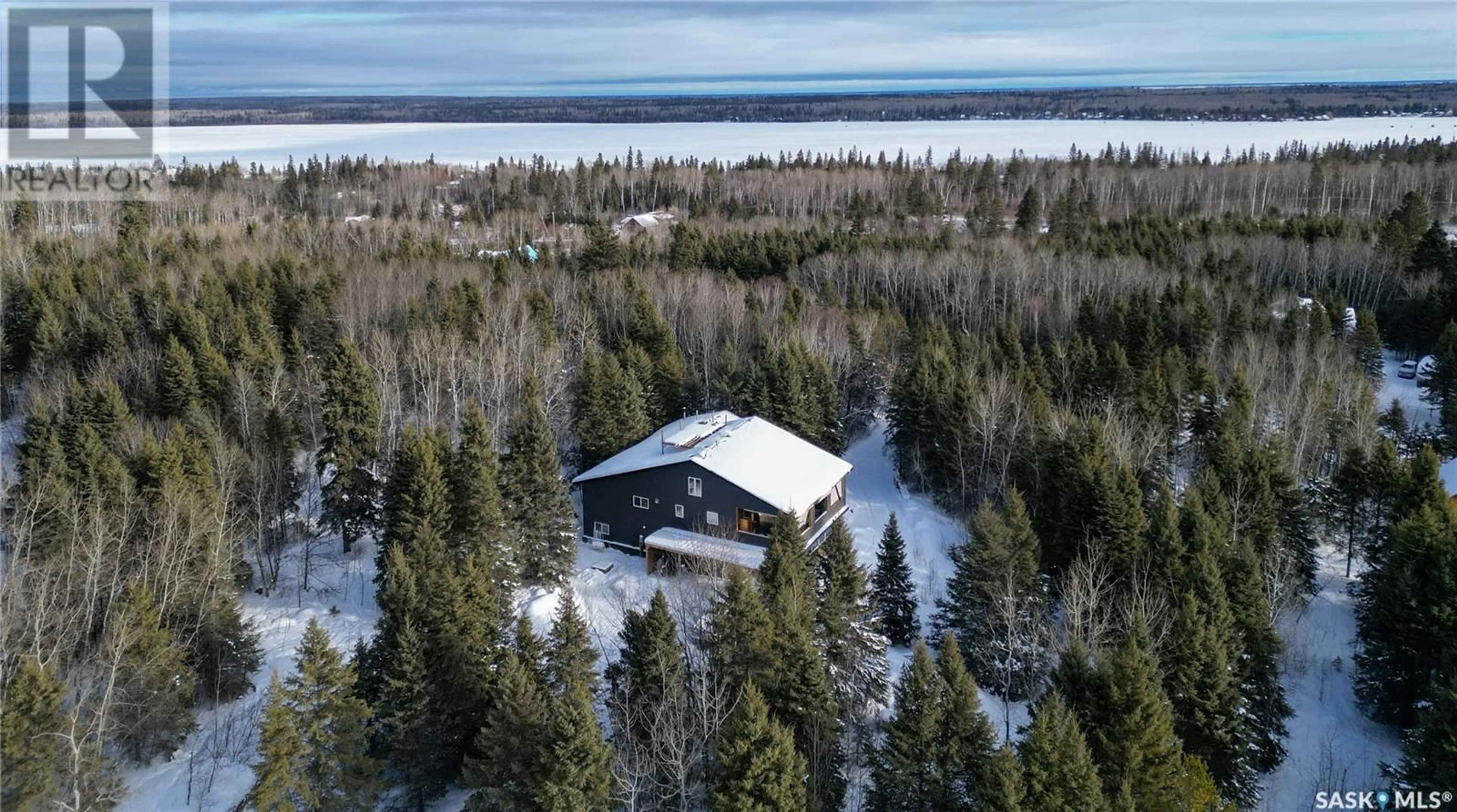 A pic from outside/outdoor area/front of a property/back of a property/a pic from drone, building for 207 Poplar CRESCENT, Paddockwood Rm No. 520 Saskatchewan S0J0N0