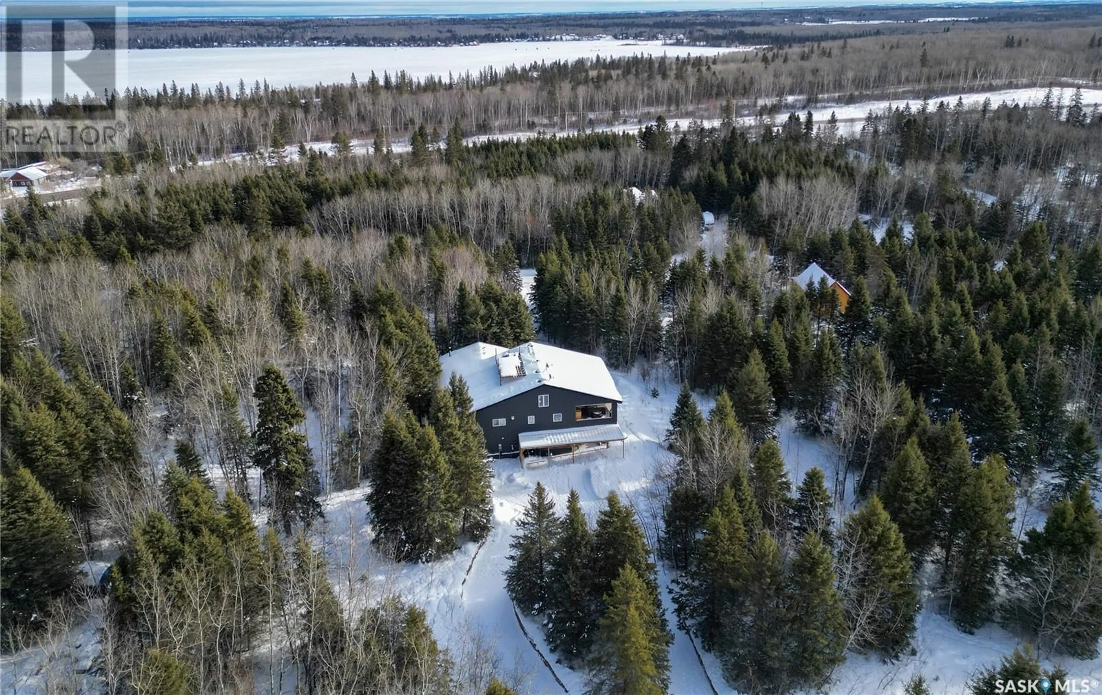 A pic from outside/outdoor area/front of a property/back of a property/a pic from drone, unknown for 207 Poplar CRESCENT, Paddockwood Rm No. 520 Saskatchewan S0J0N0