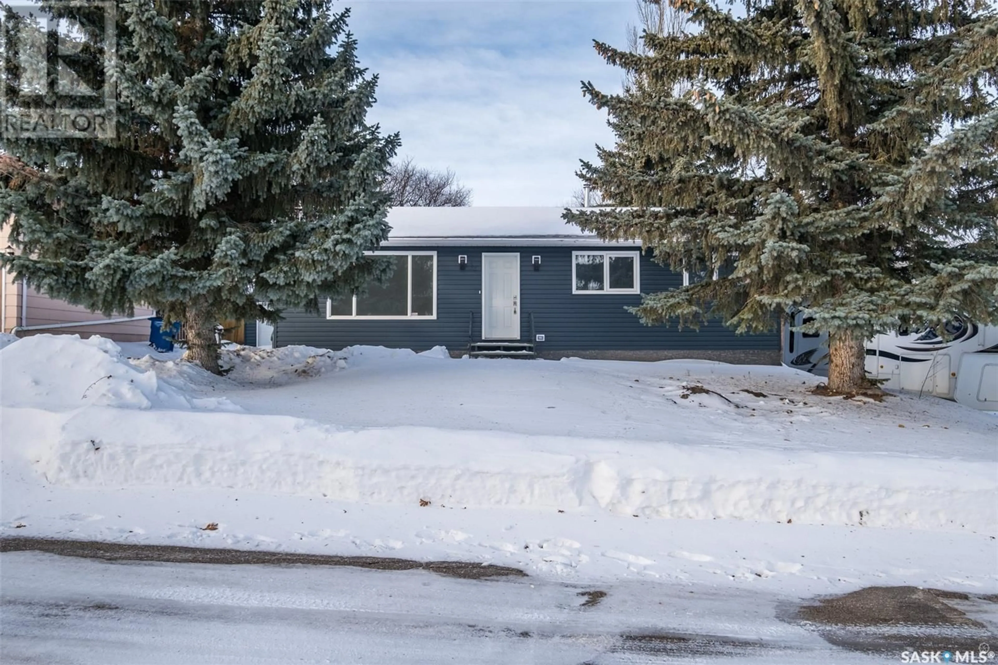 Home with vinyl exterior material, street for 34 Birch DRIVE, Birch Hills Saskatchewan S0J0G0