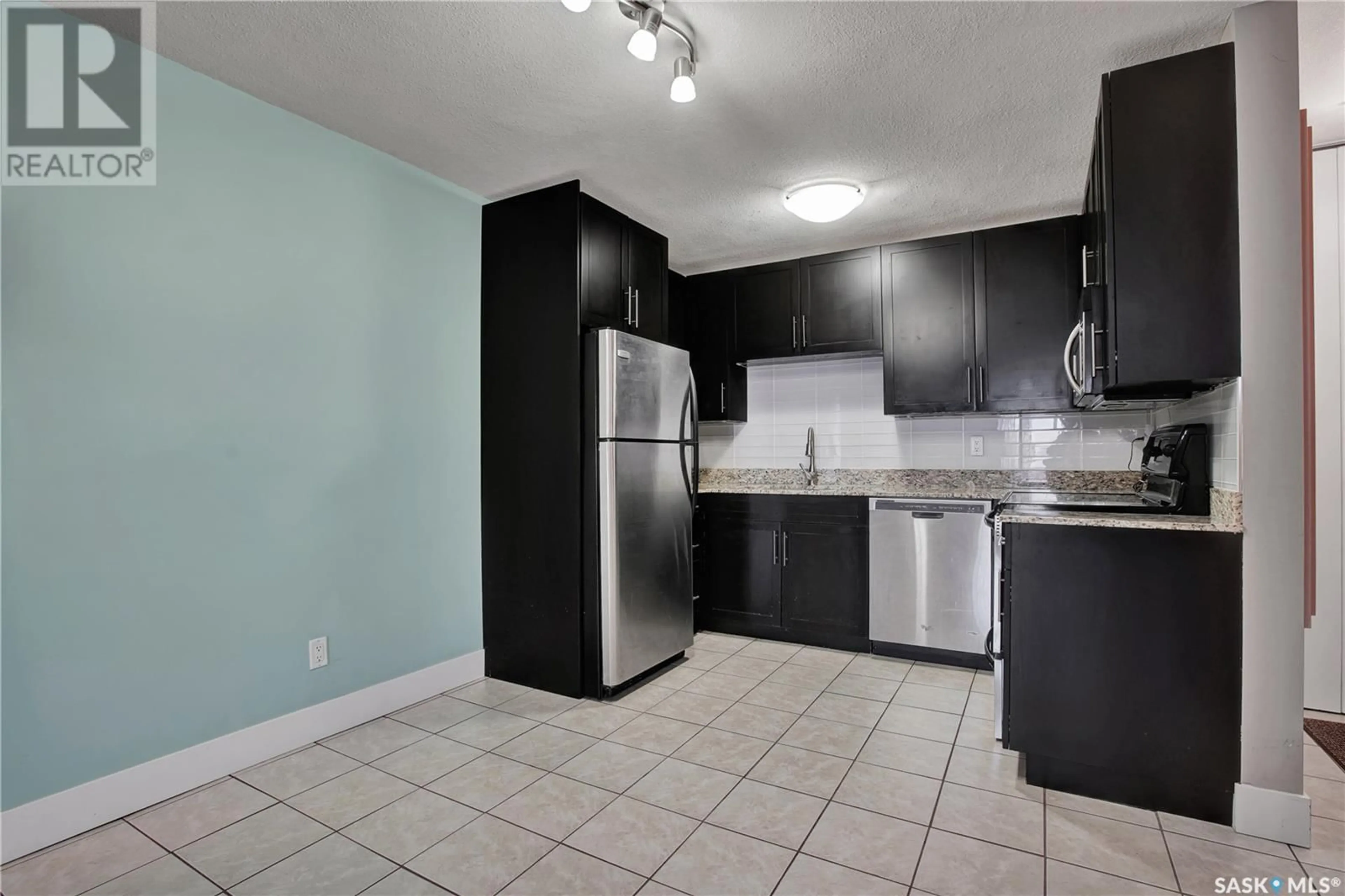 Standard kitchen, ceramic/tile floor for 12 2410 Louise STREET, Saskatoon Saskatchewan S7J0P2