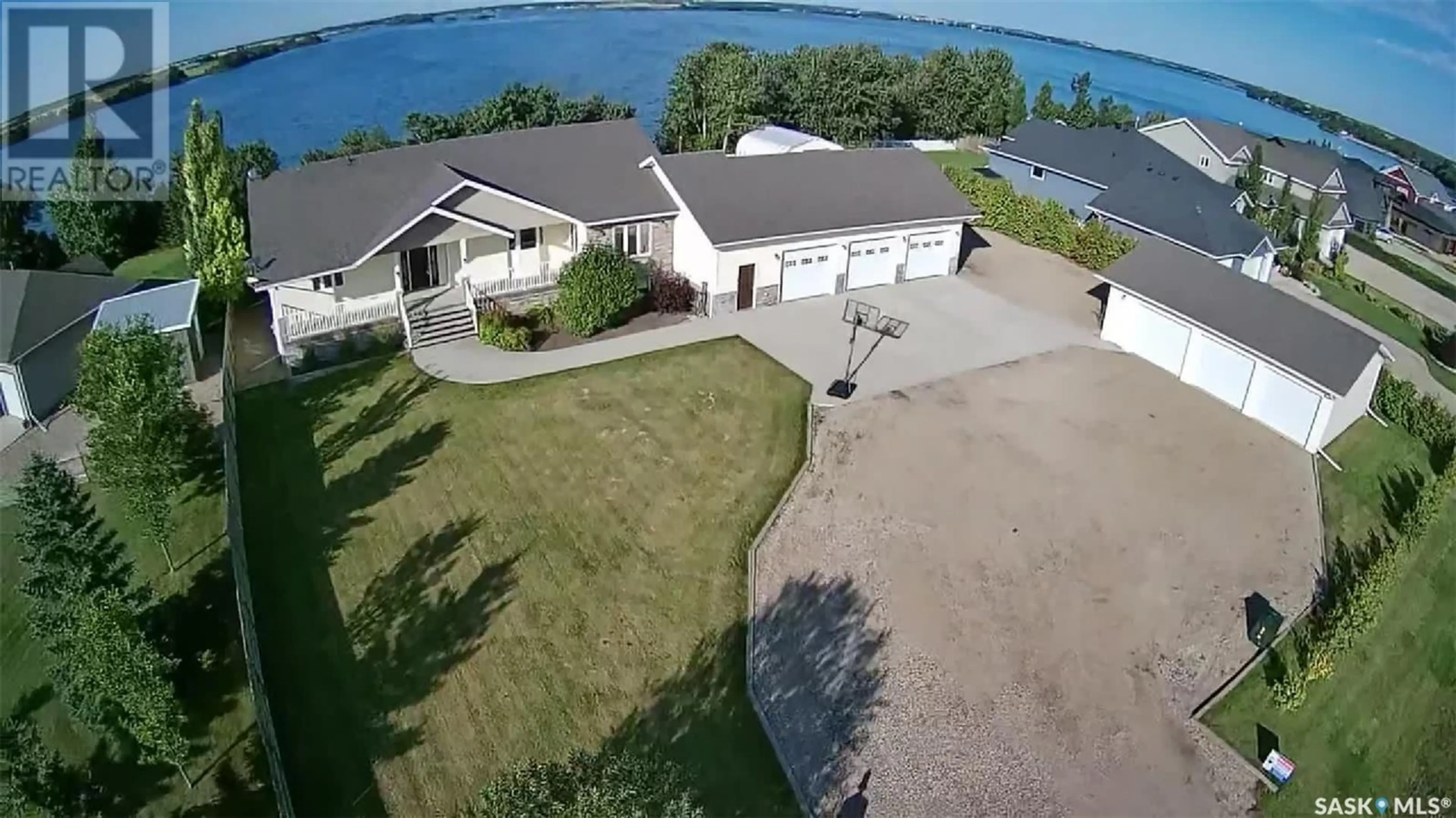 A pic from outside/outdoor area/front of a property/back of a property/a pic from drone, water/lake/river/ocean view for 26 PAPE DRIVE, Humboldt Lake Saskatchewan S0K2A0