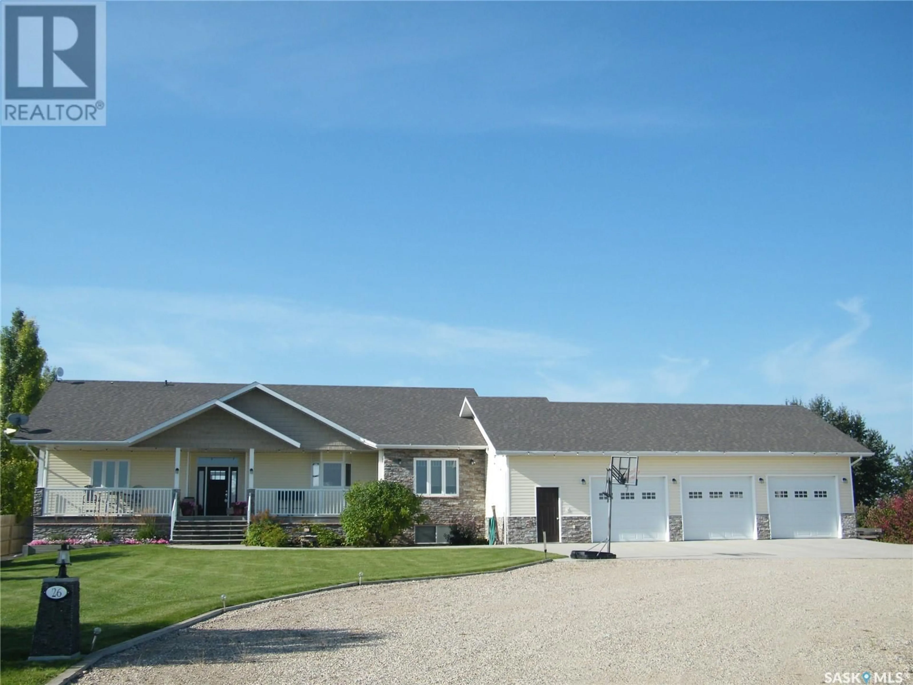 Home with vinyl exterior material, street for 26 PAPE DRIVE, Humboldt Lake Saskatchewan S0K2A0