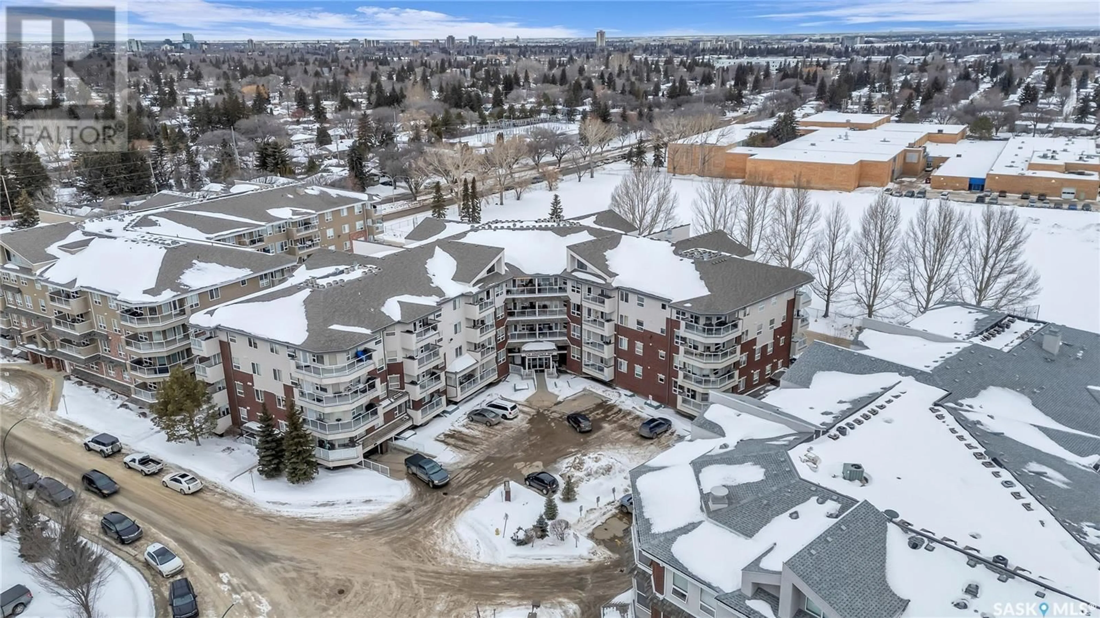 A pic from outside/outdoor area/front of a property/back of a property/a pic from drone, mountain view for 301 106 Armistice WAY, Saskatoon Saskatchewan S7J2H4