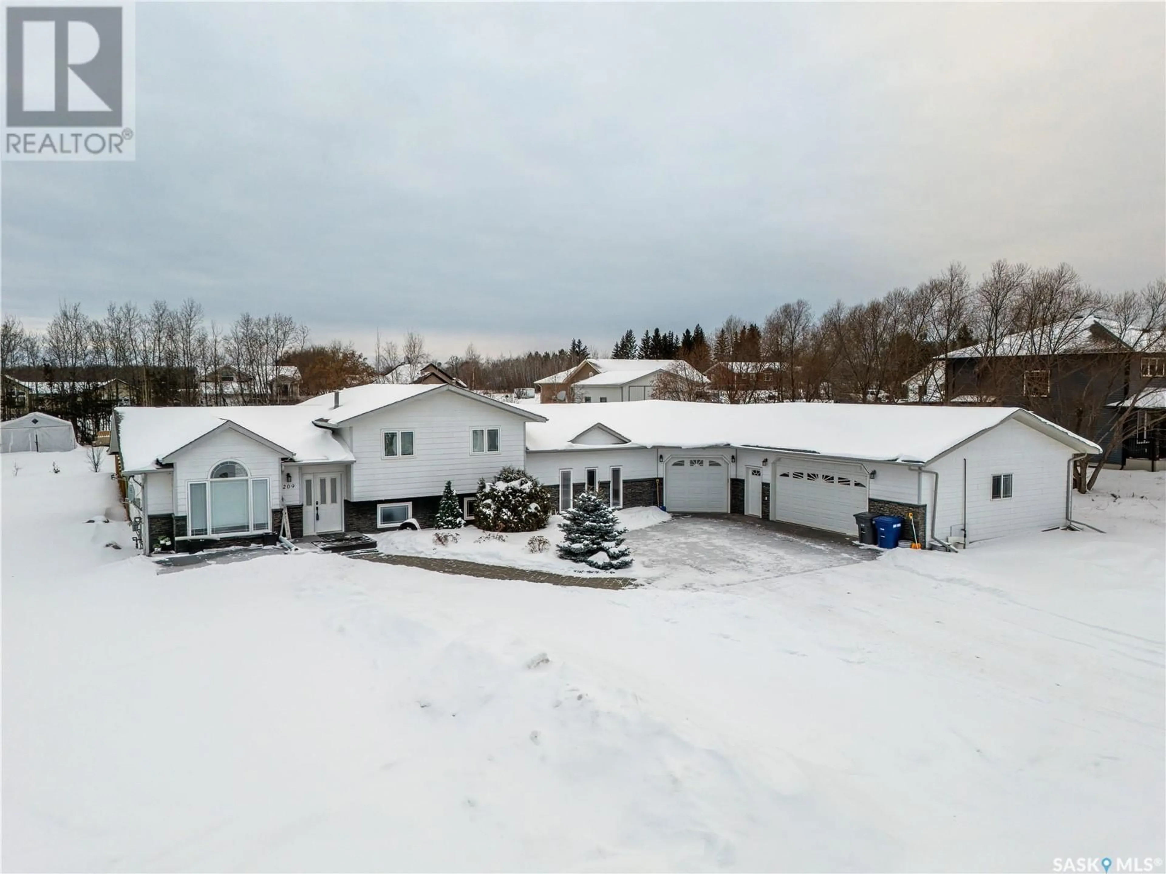 A pic from outside/outdoor area/front of a property/back of a property/a pic from drone, unknown for 209 1ST STREET, Pierceland Saskatchewan S0M2K0