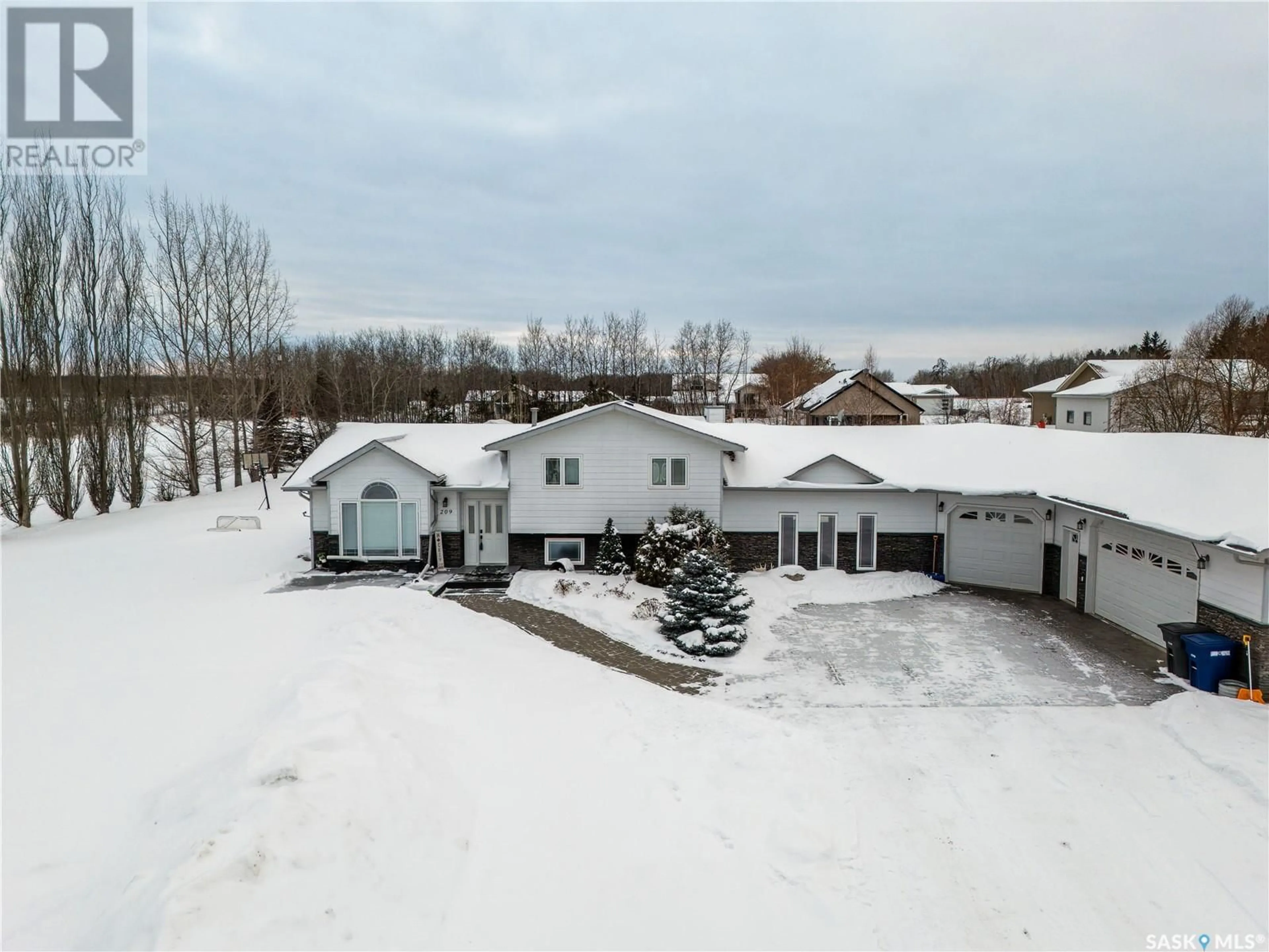 A pic from outside/outdoor area/front of a property/back of a property/a pic from drone, unknown for 209 1st STREET W, Pierceland Saskatchewan S0M2K0