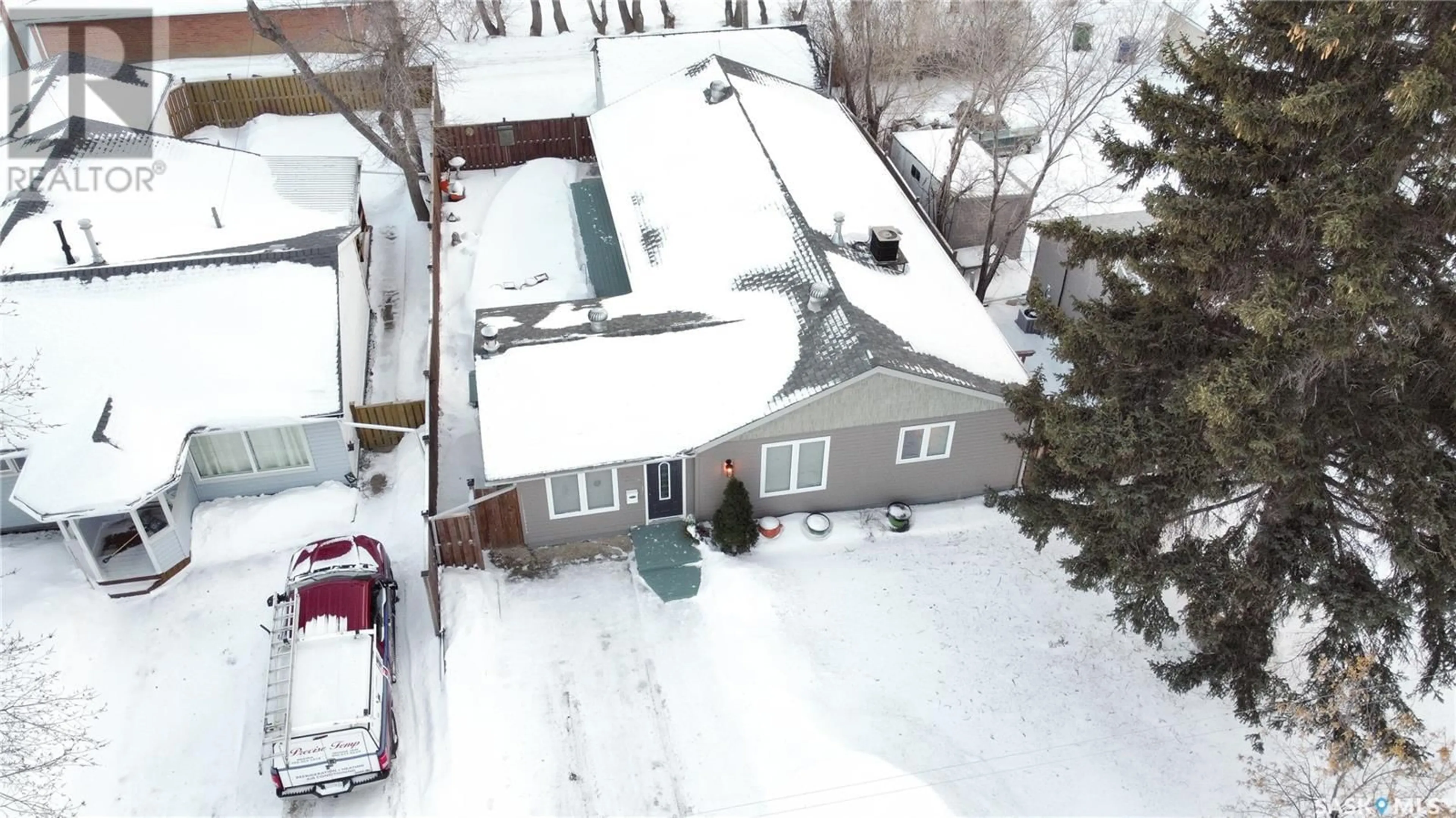 A pic from outside/outdoor area/front of a property/back of a property/a pic from drone, street for 1045 Brown STREET, Moose Jaw Saskatchewan S6H2Z4