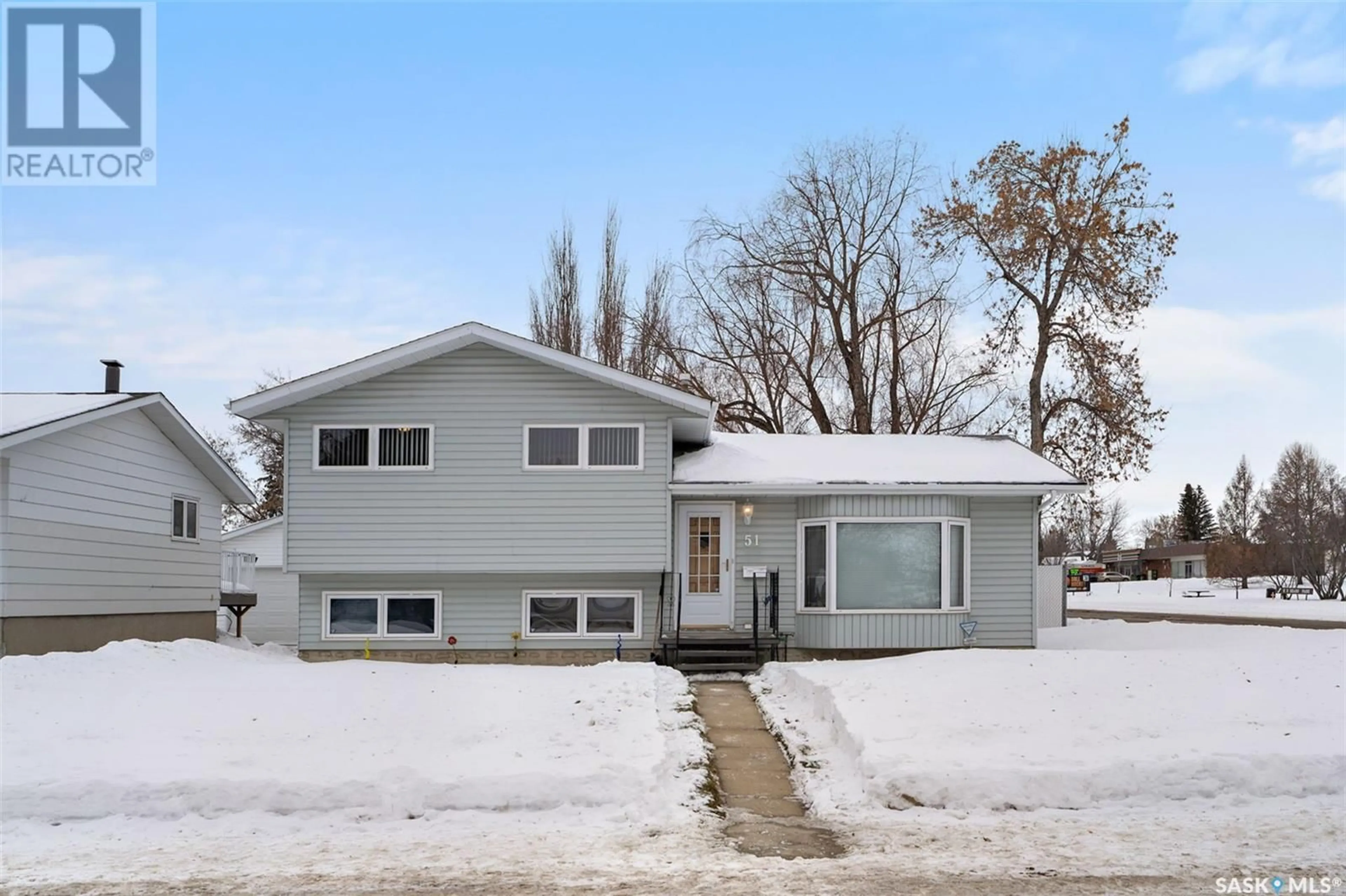 Home with vinyl exterior material, street for 51 Crimp PLACE, Saskatoon Saskatchewan S7M4E9