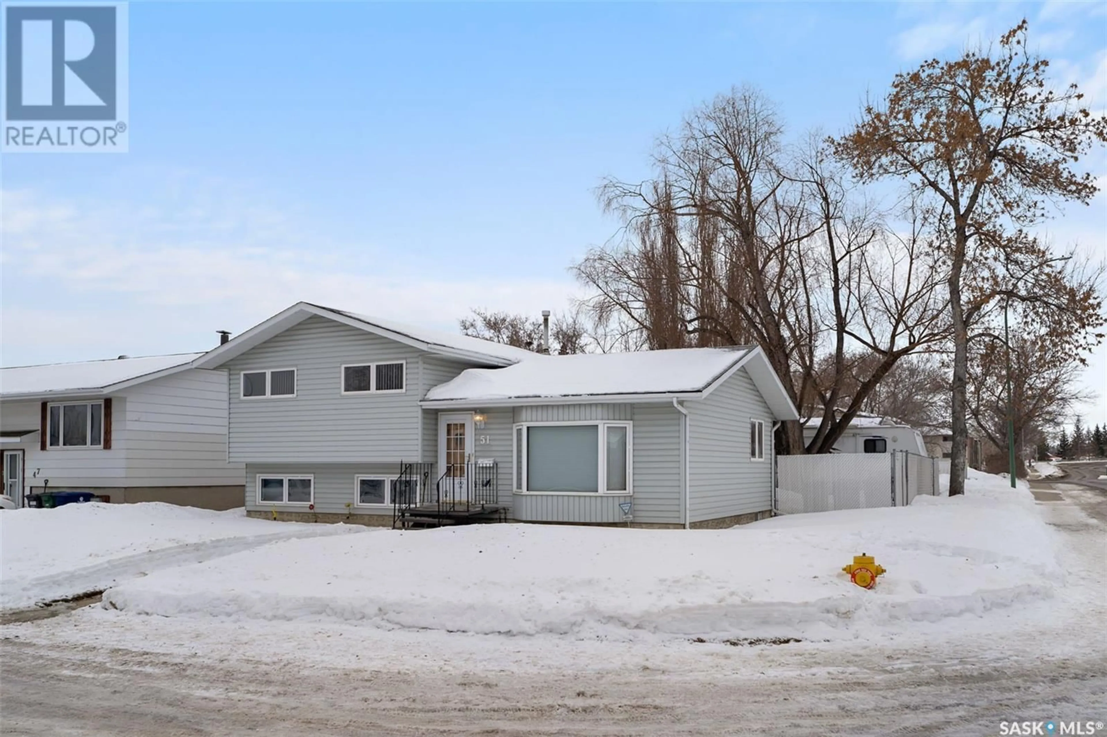 Home with vinyl exterior material, street for 51 Crimp PLACE, Saskatoon Saskatchewan S7M4E9