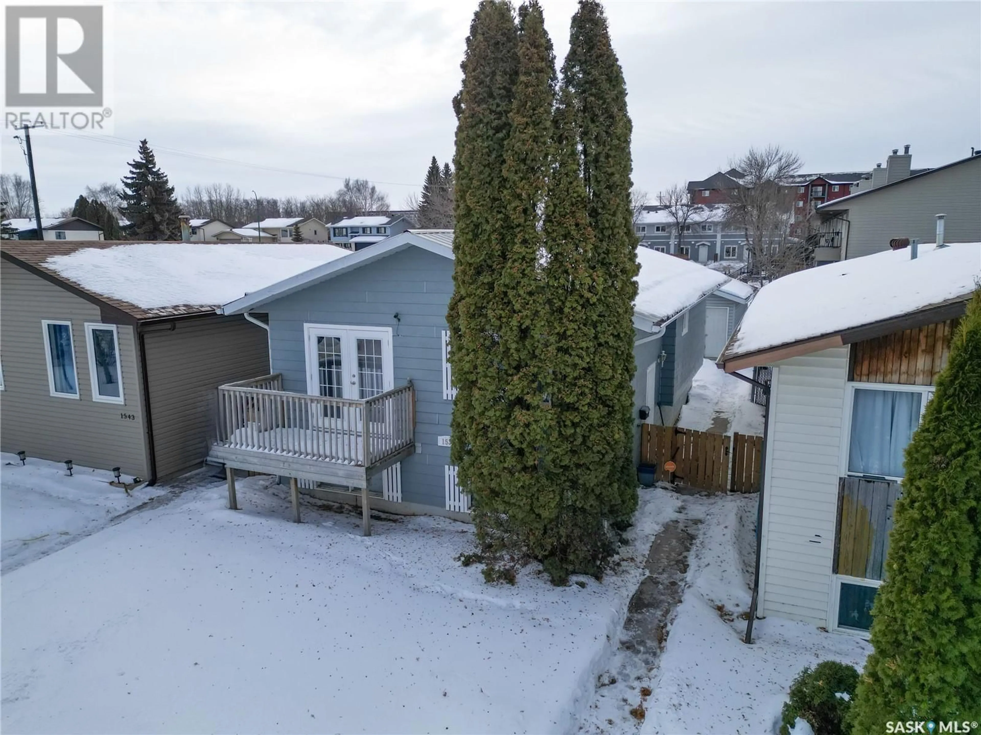 A pic from outside/outdoor area/front of a property/back of a property/a pic from drone, street for 1535 McIntosh DRIVE, Prince Albert Saskatchewan S6V7B6