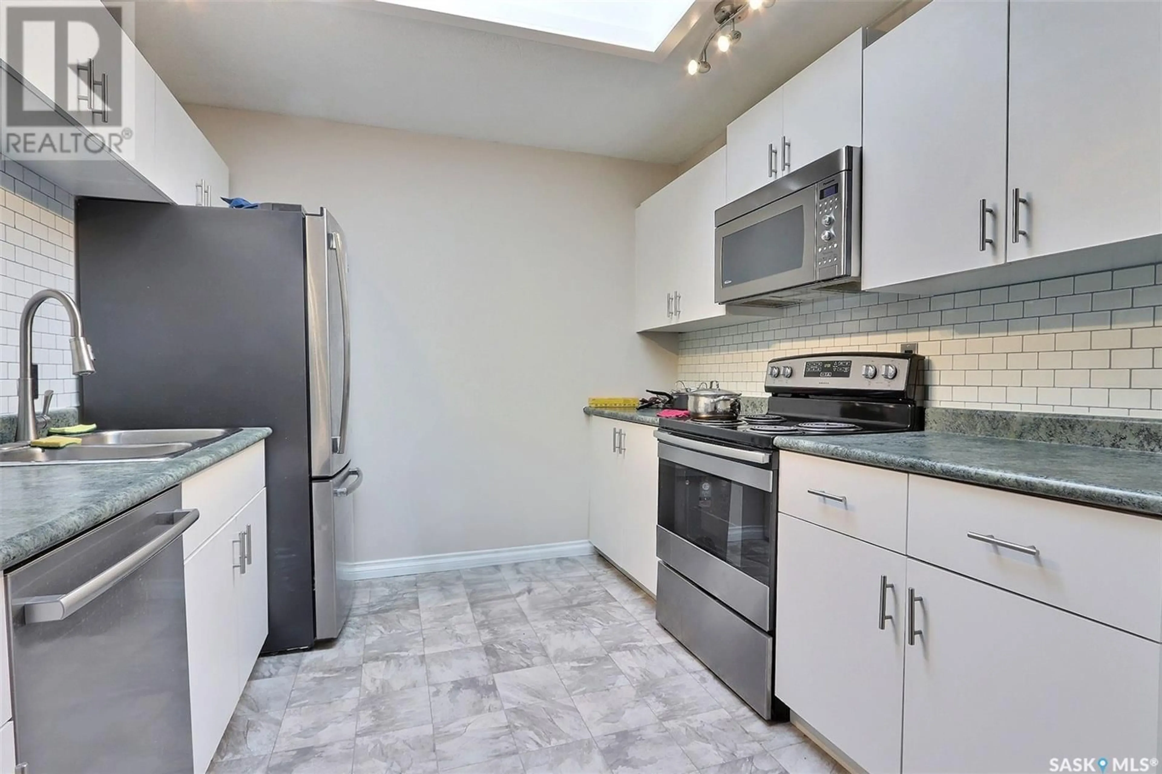 Standard kitchen, ceramic/tile floor for 1535 McIntosh DRIVE, Prince Albert Saskatchewan S6V7B6