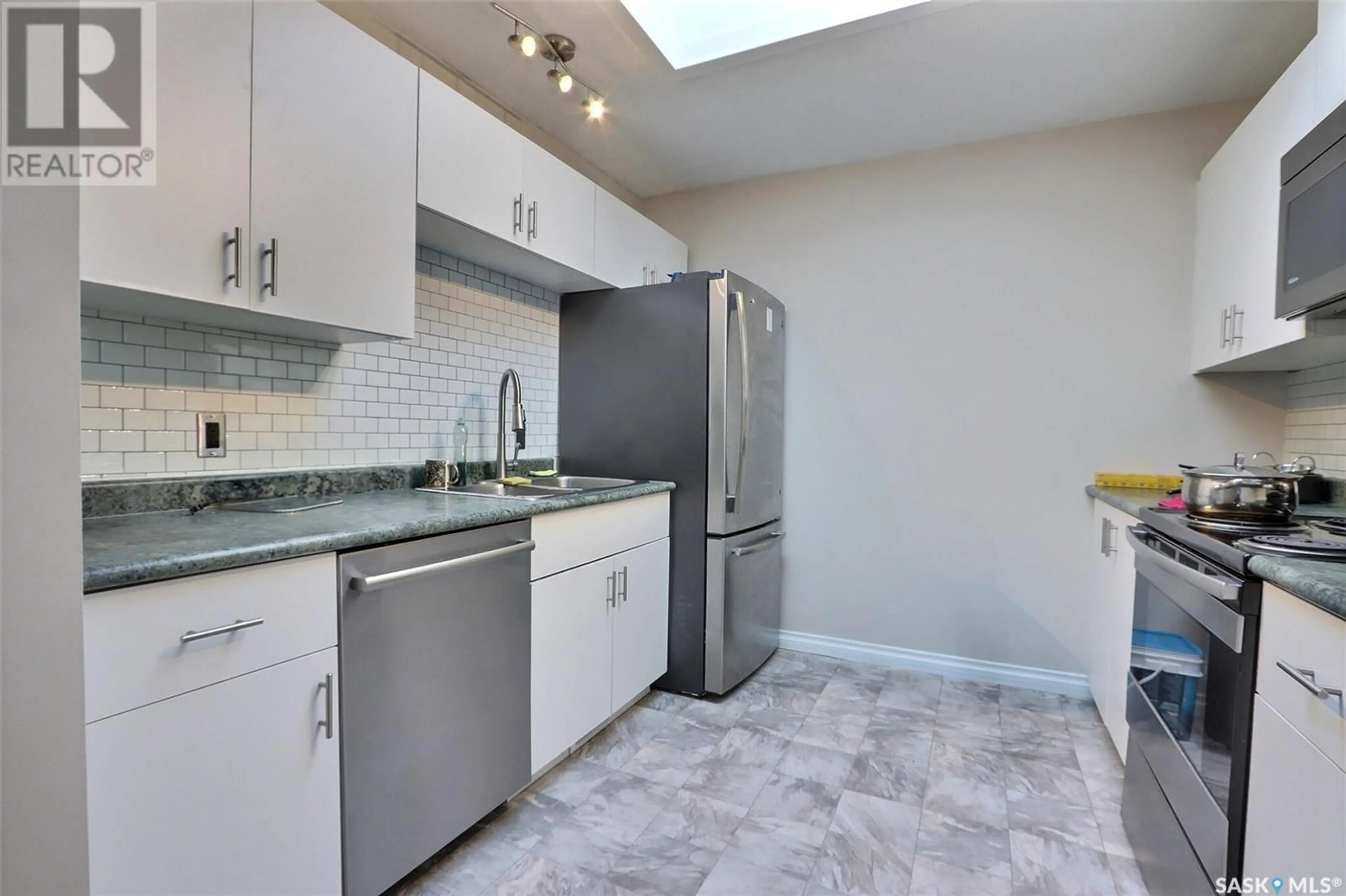 Standard kitchen, ceramic/tile floor for 1535 McIntosh DRIVE, Prince Albert Saskatchewan S6V7B6