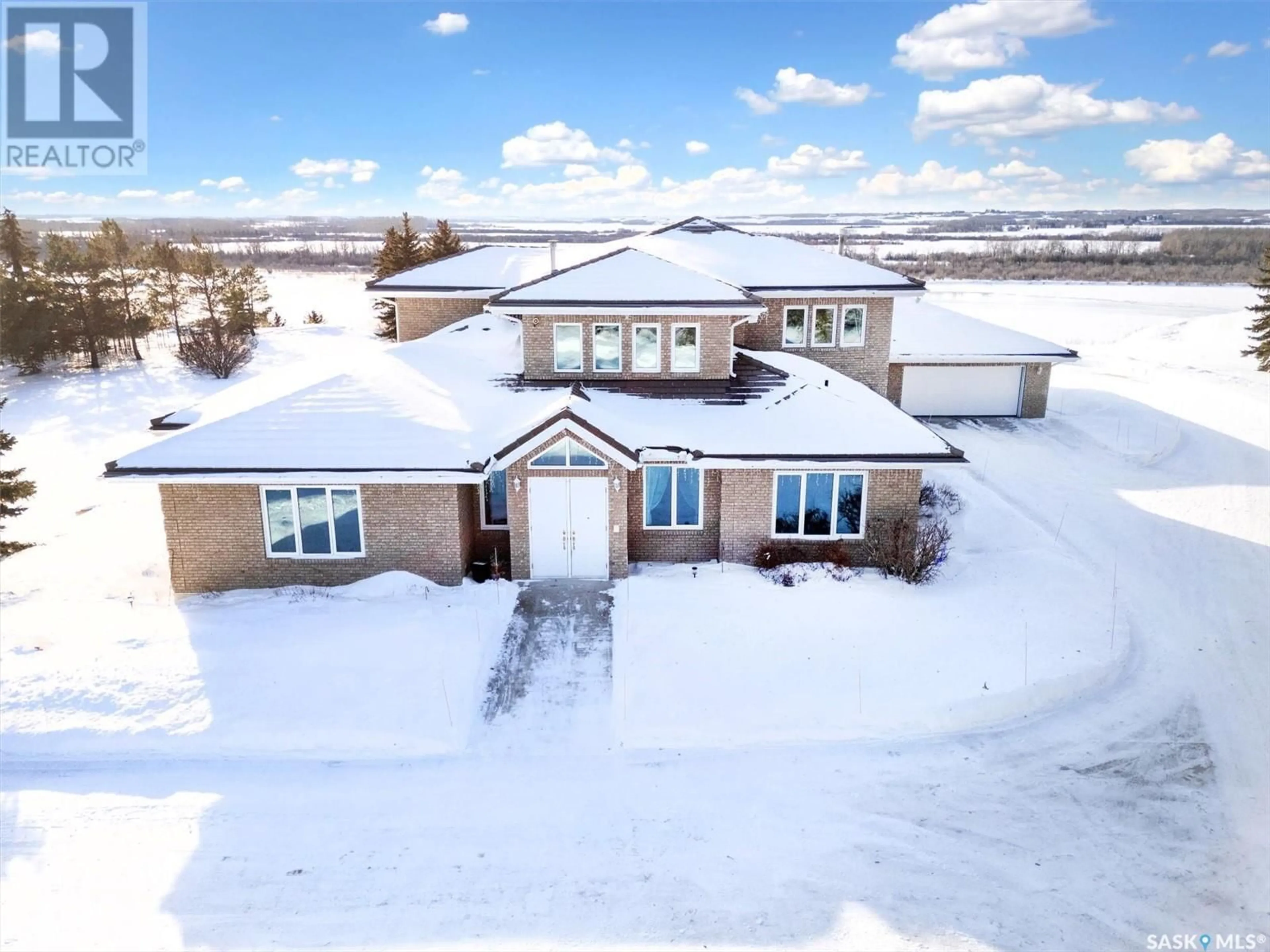 A pic from outside/outdoor area/front of a property/back of a property/a pic from drone, unknown for 9 Cherry LANE, Riverside Estates Saskatchewan S7T1A1